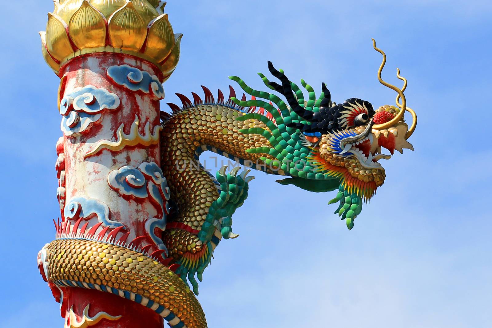 golden Chinese dragon on beautiful sky background