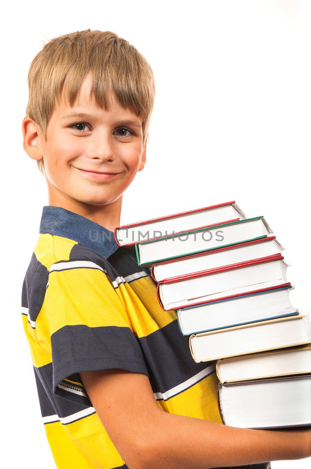 School boy is holding books by bloodua