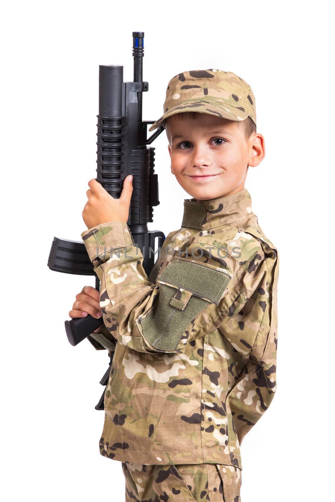 Young boy dressed like a soldier with rifle by bloodua