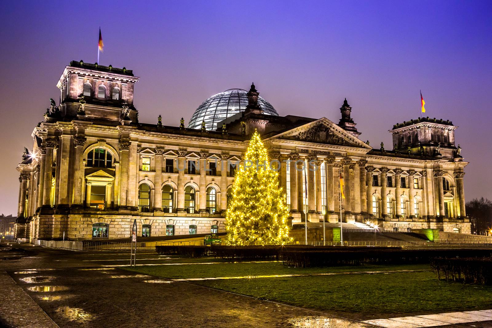 reichstag in berlin in winter at night with christmas tree by bloodua