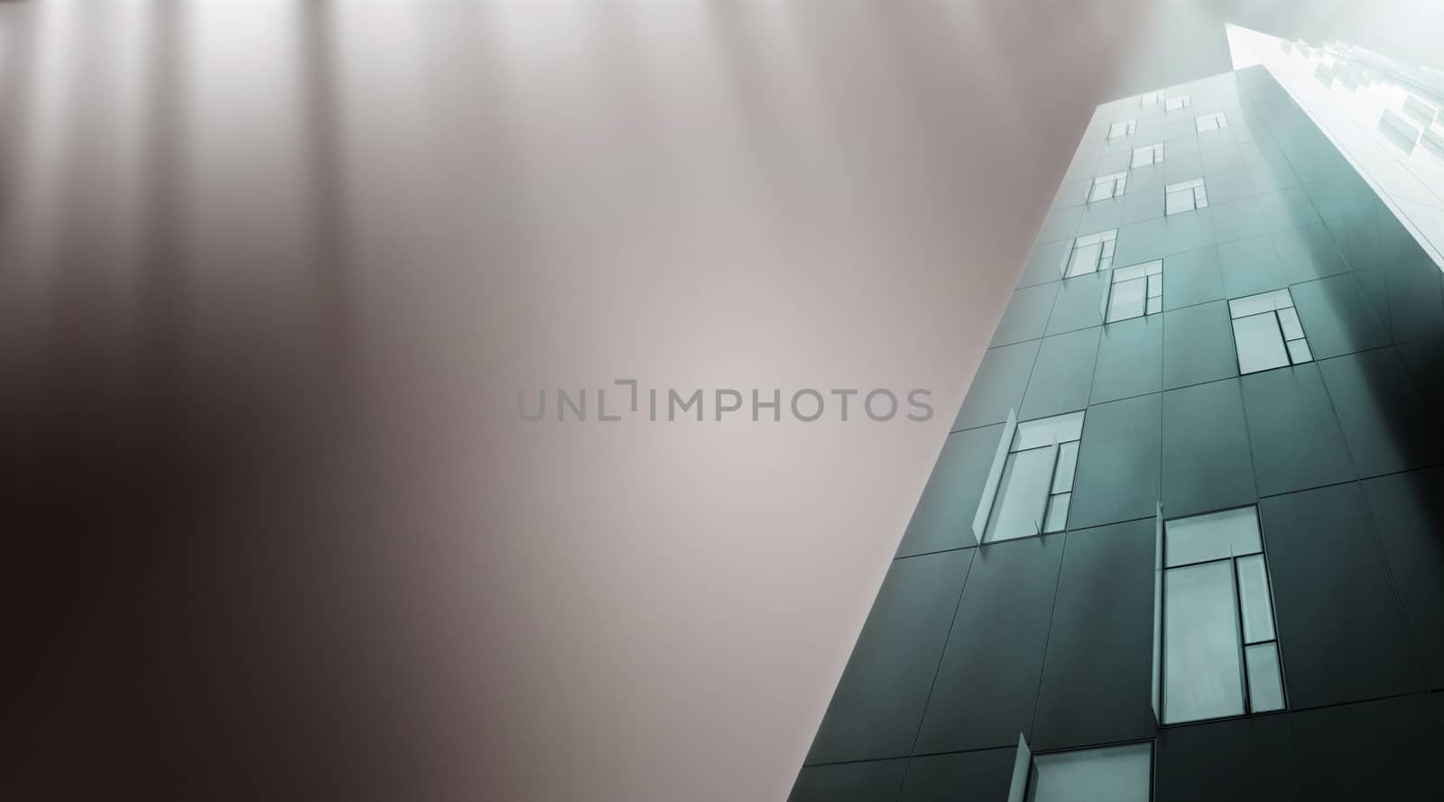 Modern skyscrapers isolated on grey.