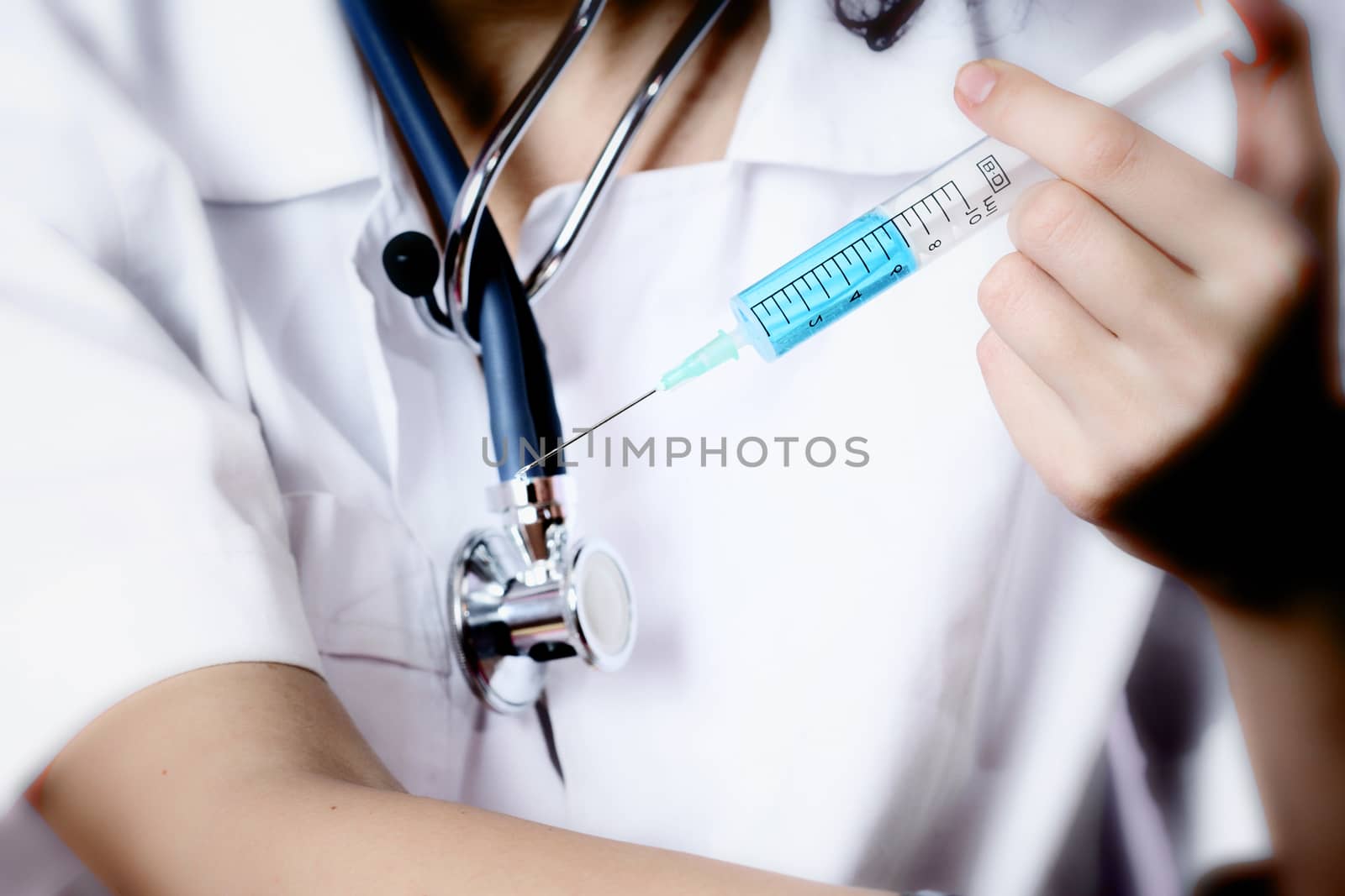 Portrait of a young doctor with stethoscope. More of this series on my portfolio !