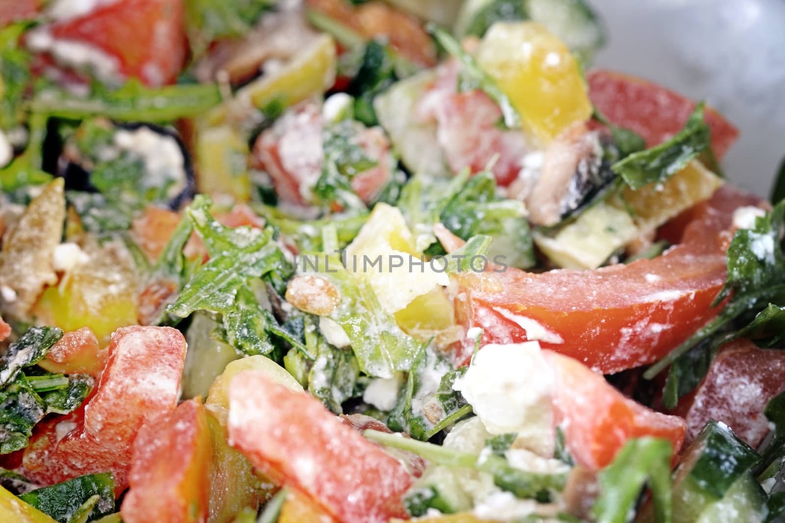 Healthy salad with vegetables and cheese