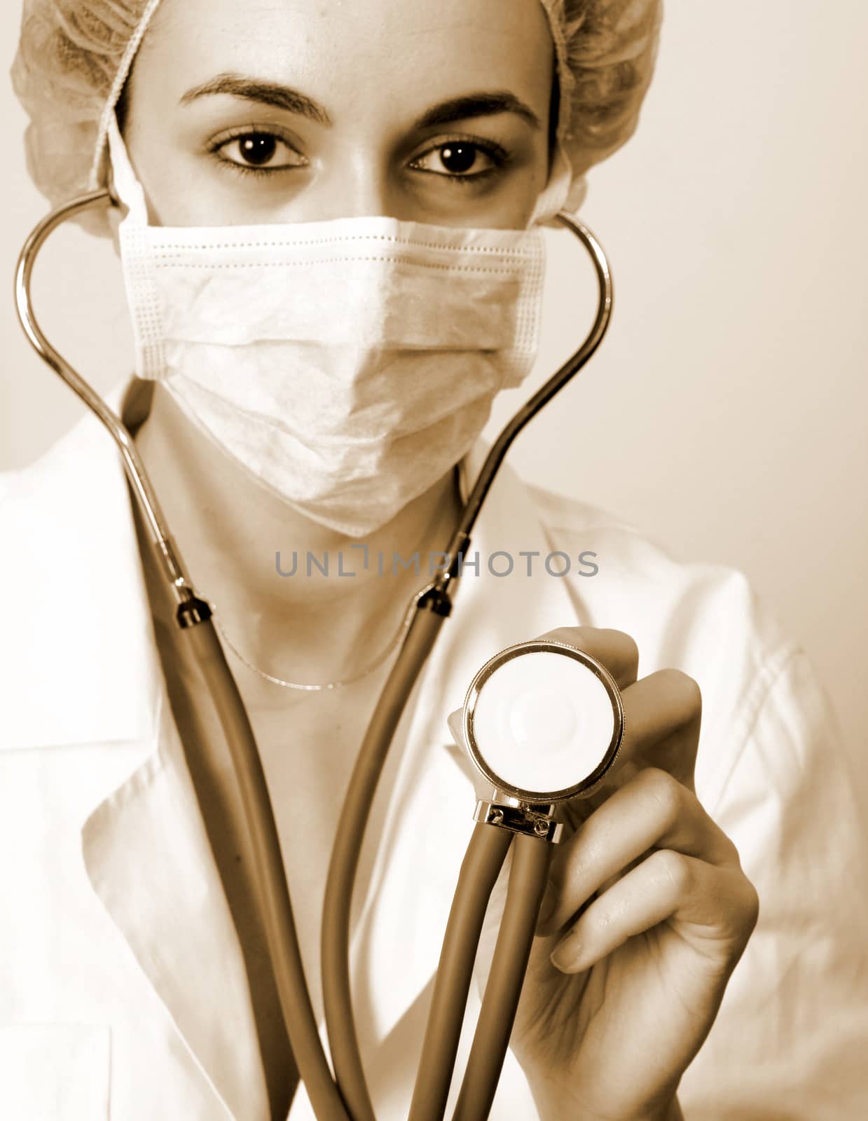 Young doctor with stethoscope. by arosoft