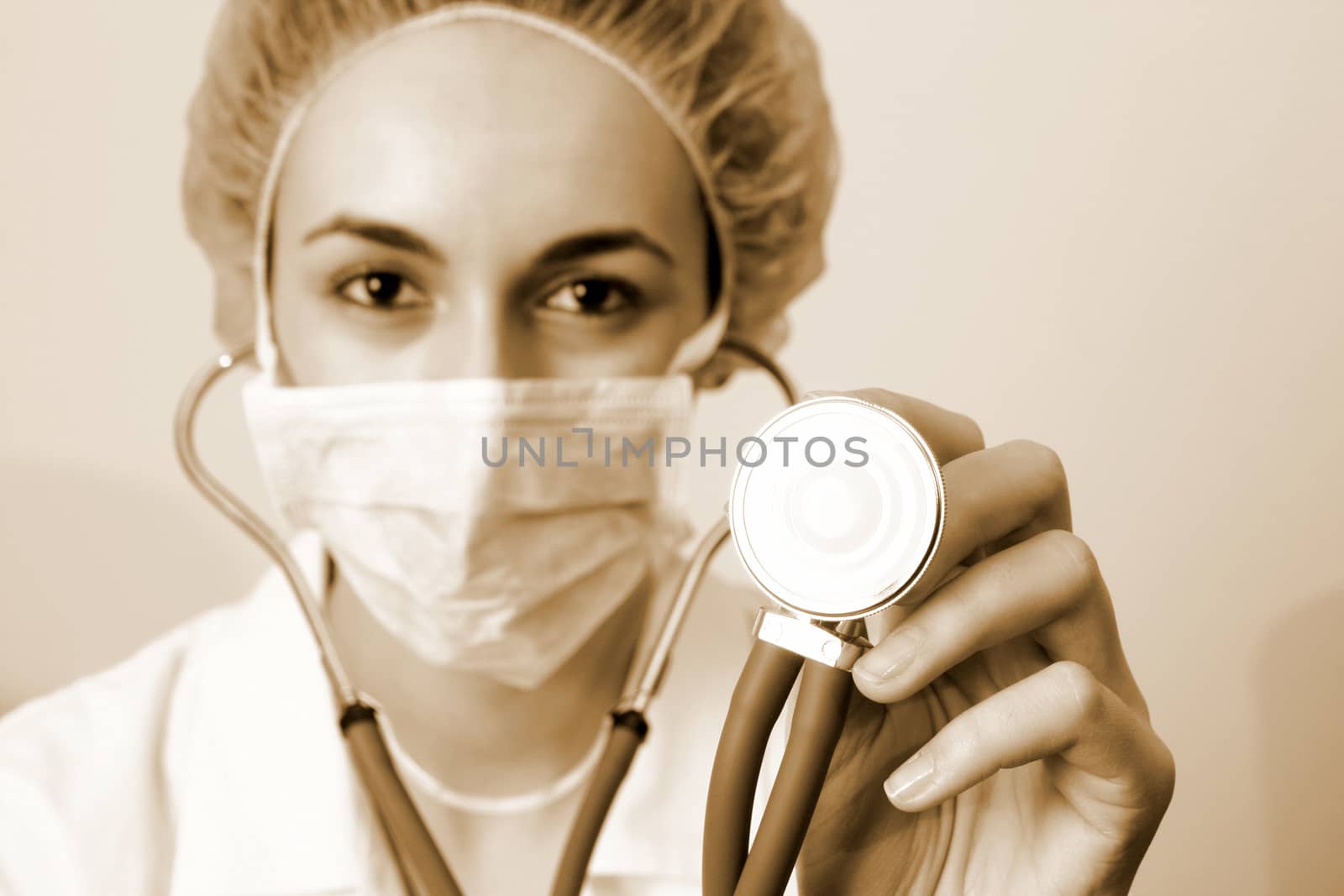 Portrait of a young doctor with stethoscope. by arosoft