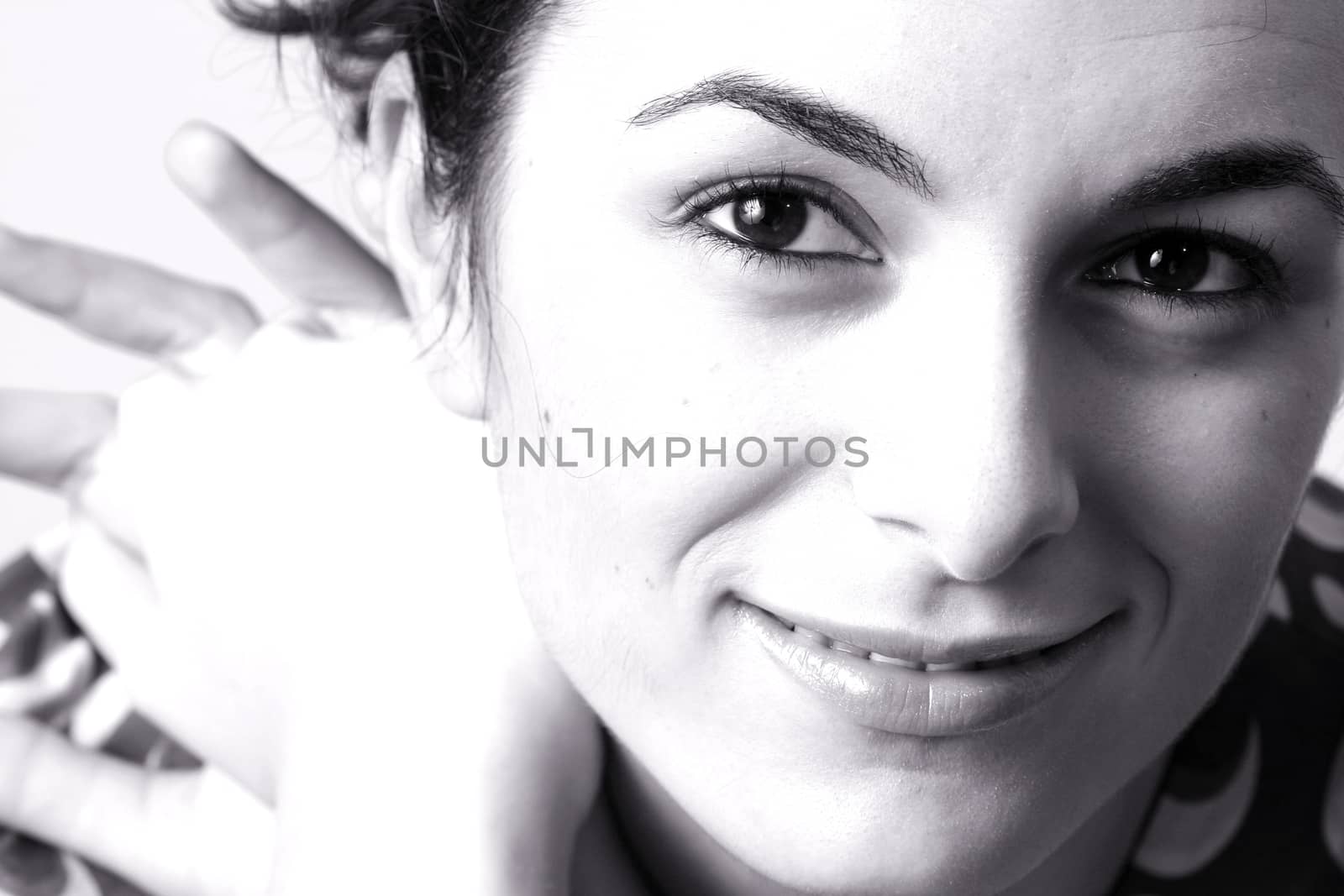 Close-up of a beautiful young woman face.