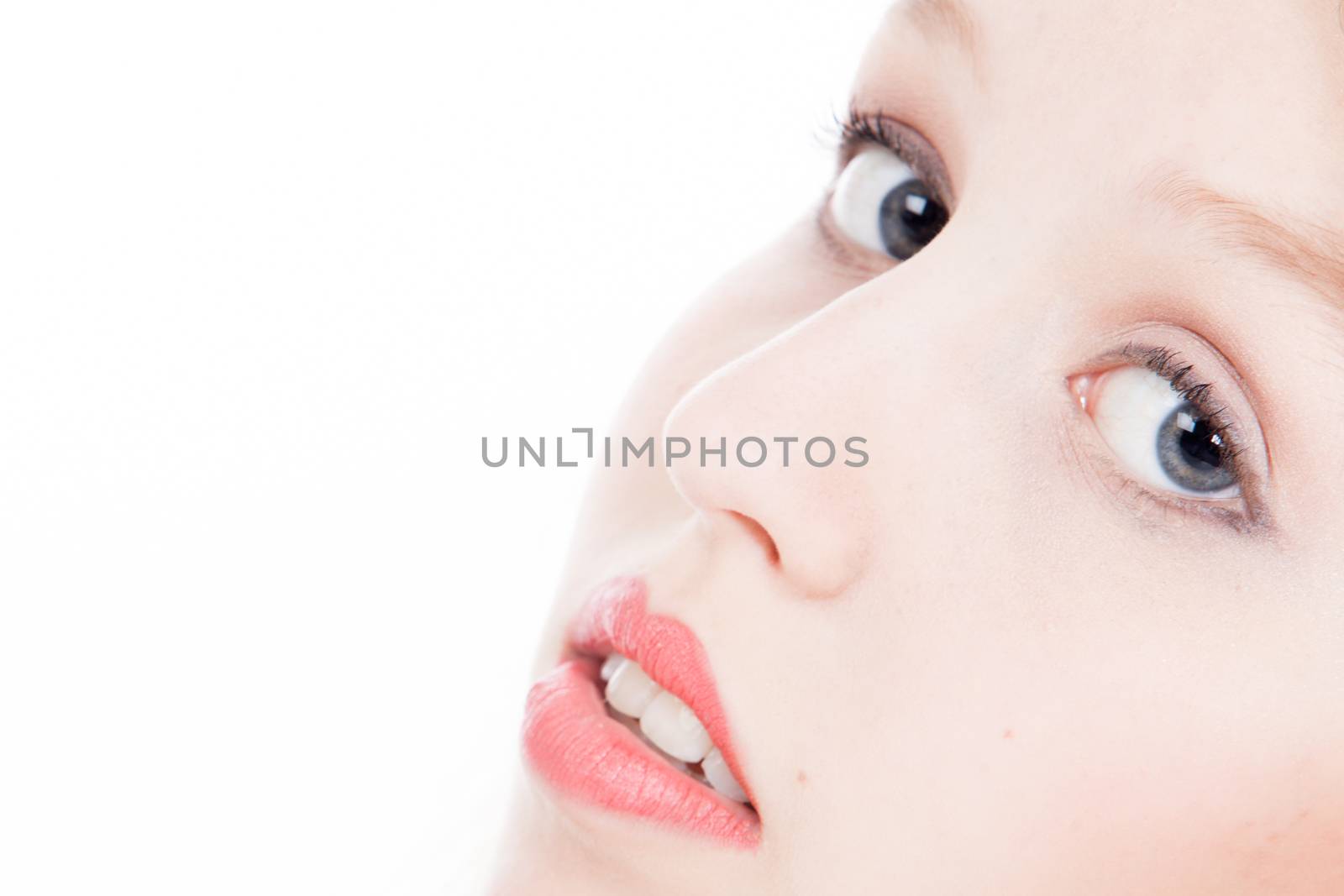 Closeup portrait from young blond woman on a white background 