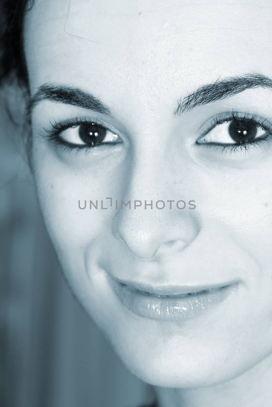 Close-up of a beautiful young woman face.