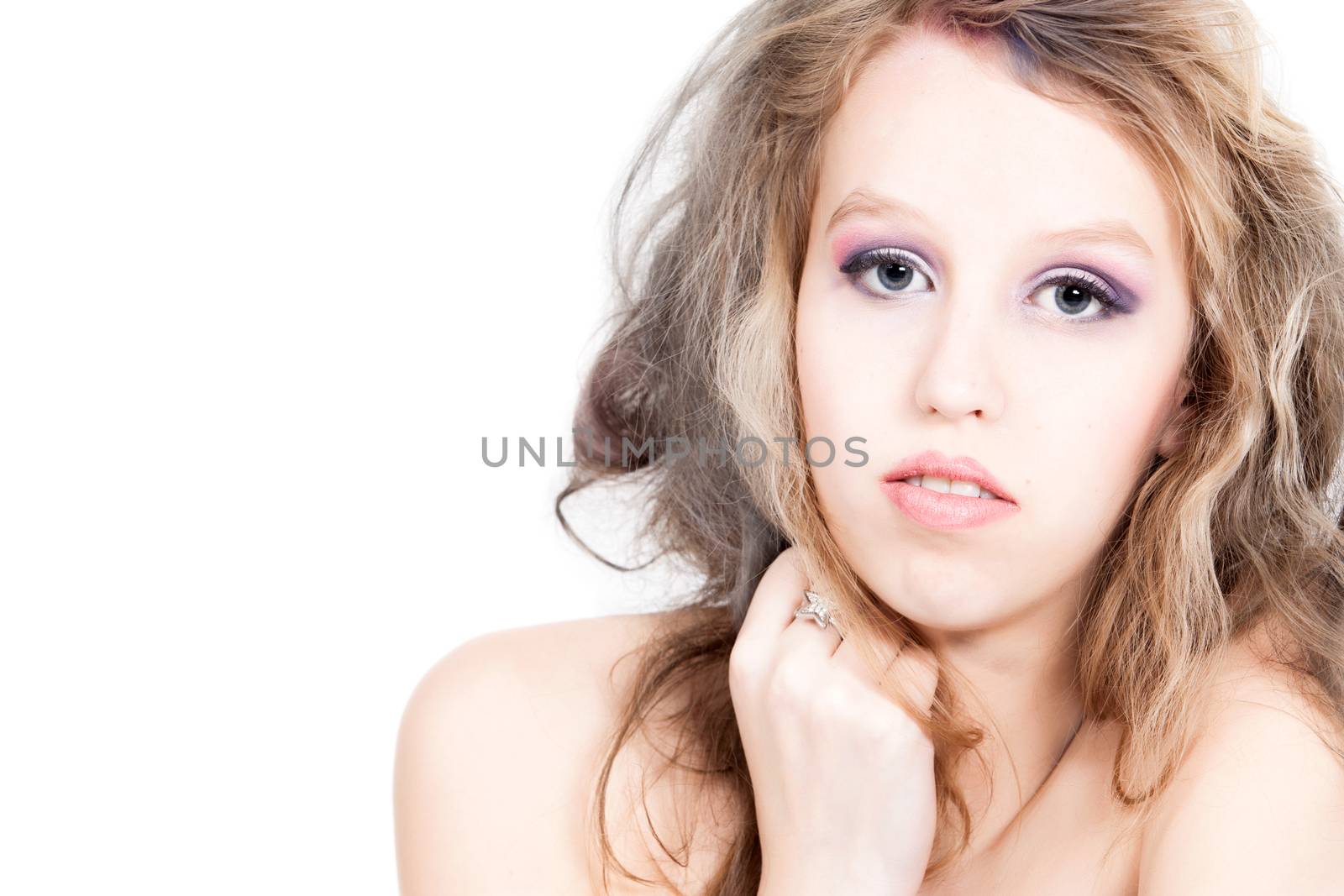 Portrait from young blond woman on a white background with much skin visible