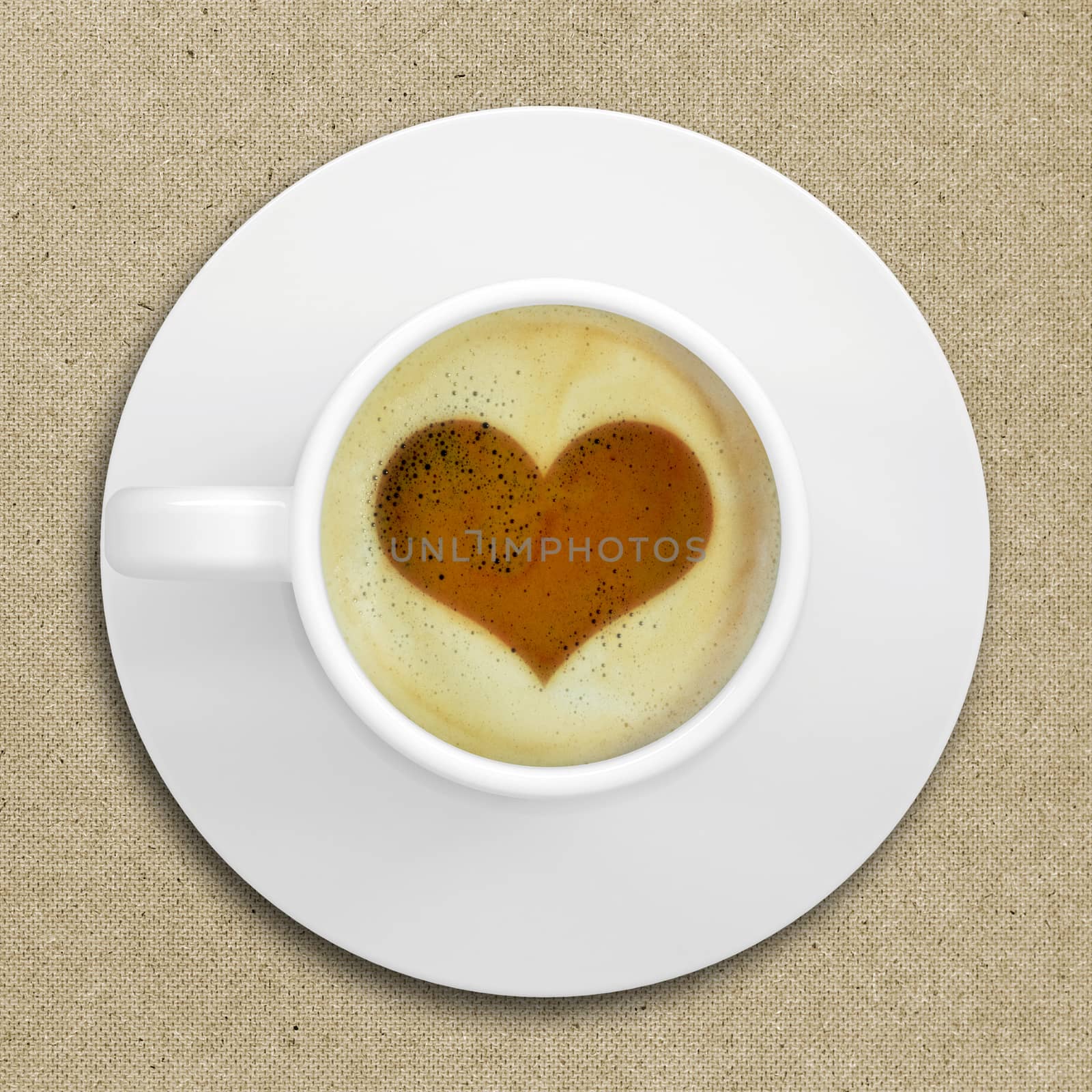 Cup of coffee standing on a wooden surface. Picture of the heart in the coffee crema. top view