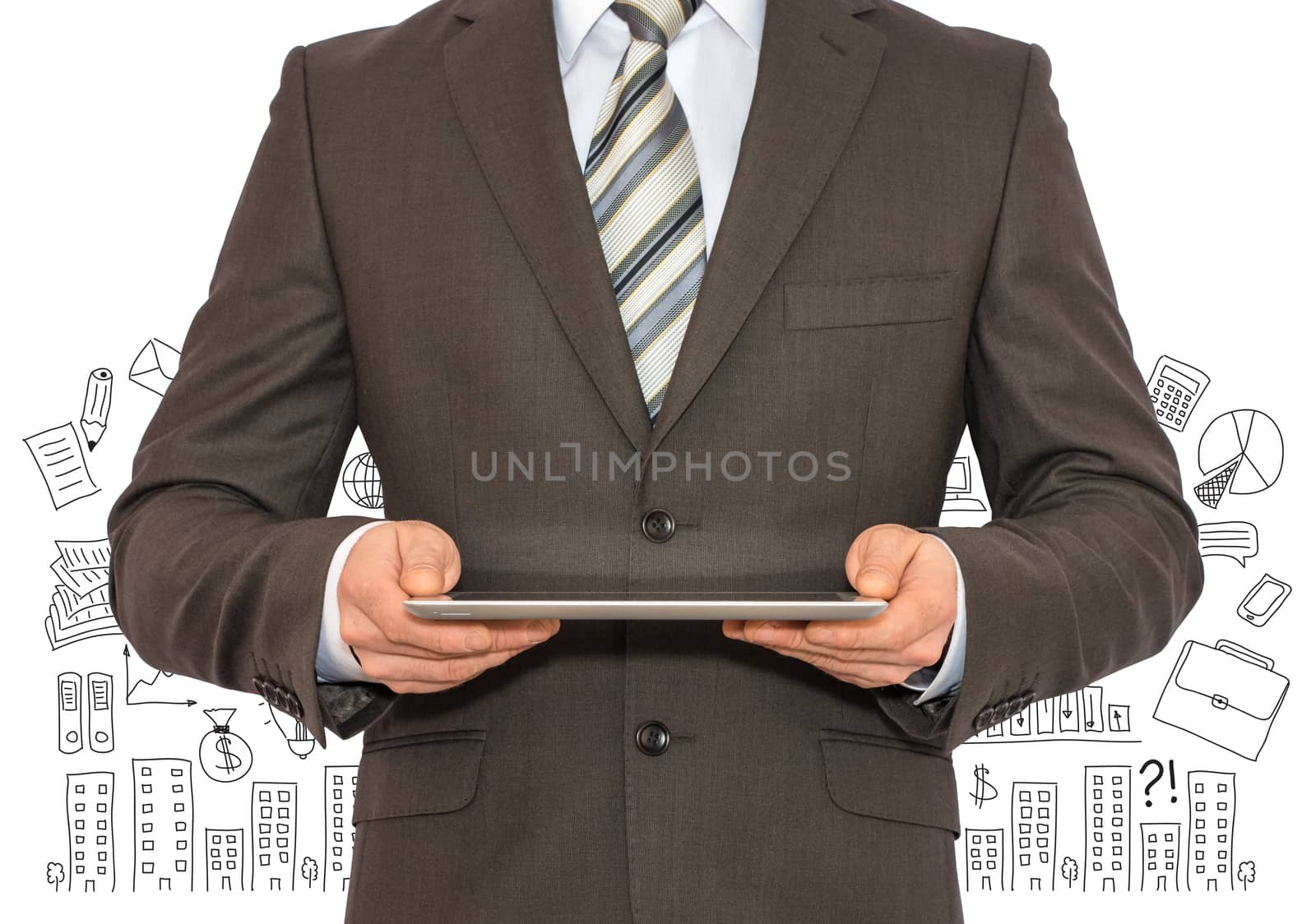 Businessman with a tablet in hands and business sketches. Business concept