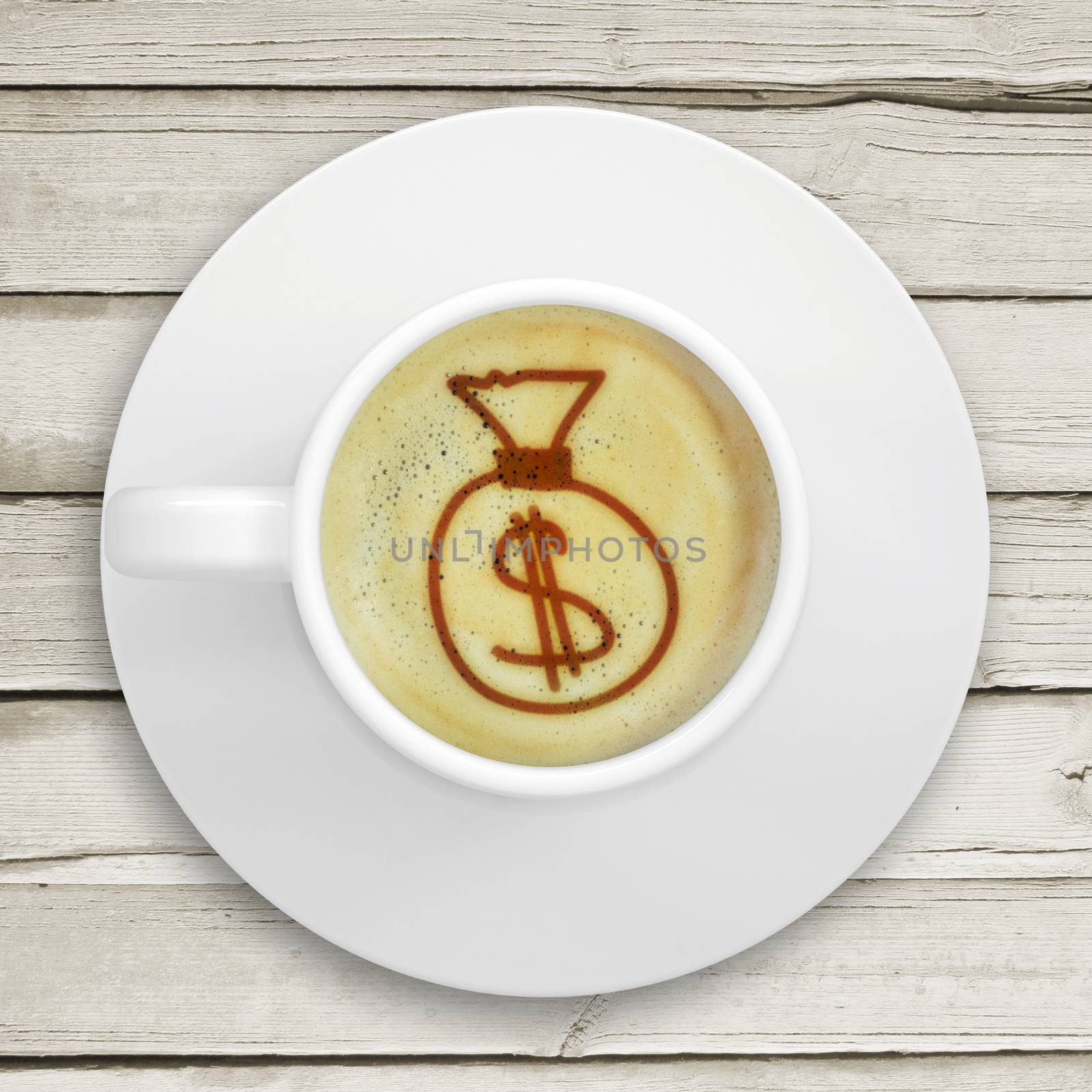 Cup of coffee standing on a wooden surface. Picture of the bag of money in the coffee crema. top view