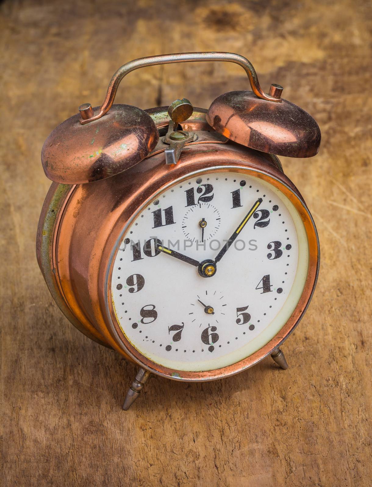 Vintage watch on a wooden board