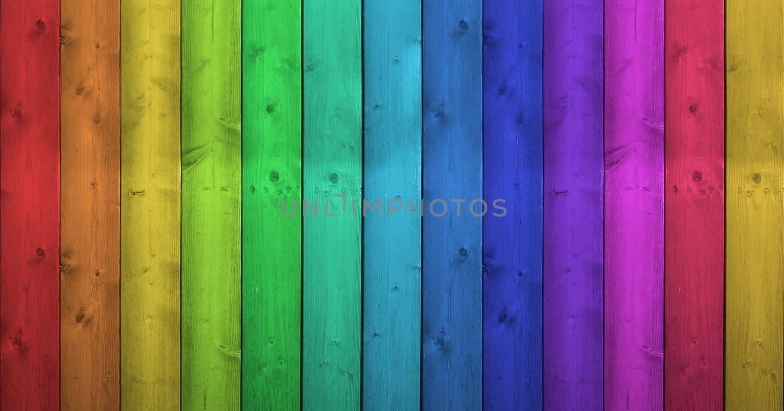 Rainbow Colors On Wooden Background by nirodesign