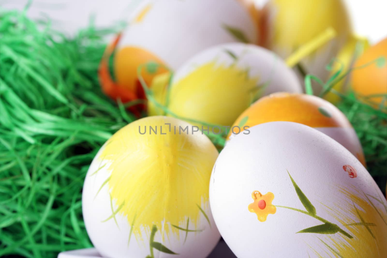 Painted easter eggs in grass.