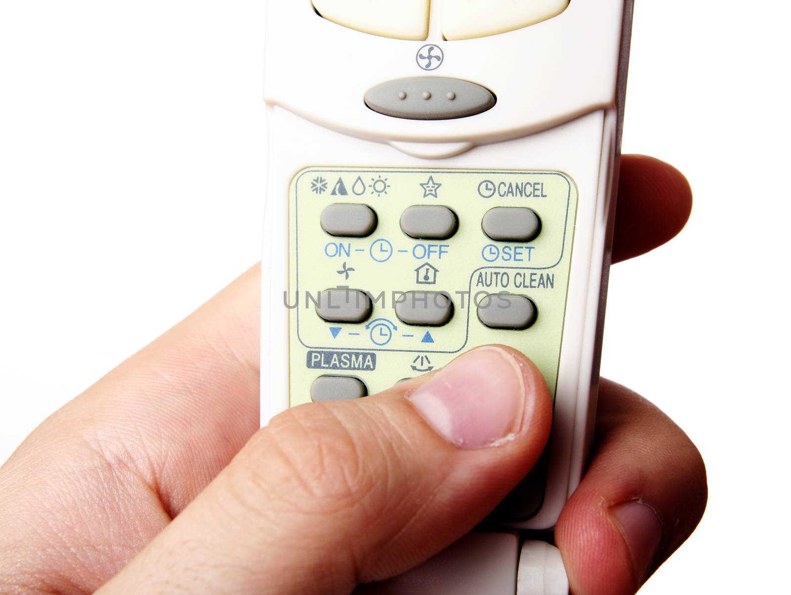 Remote control in a man hand. Isolated on white background.