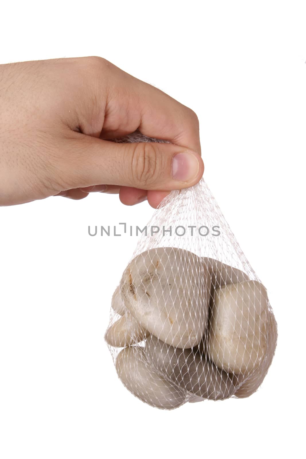 Man holding some pieces of rocks. Isolate on white.
