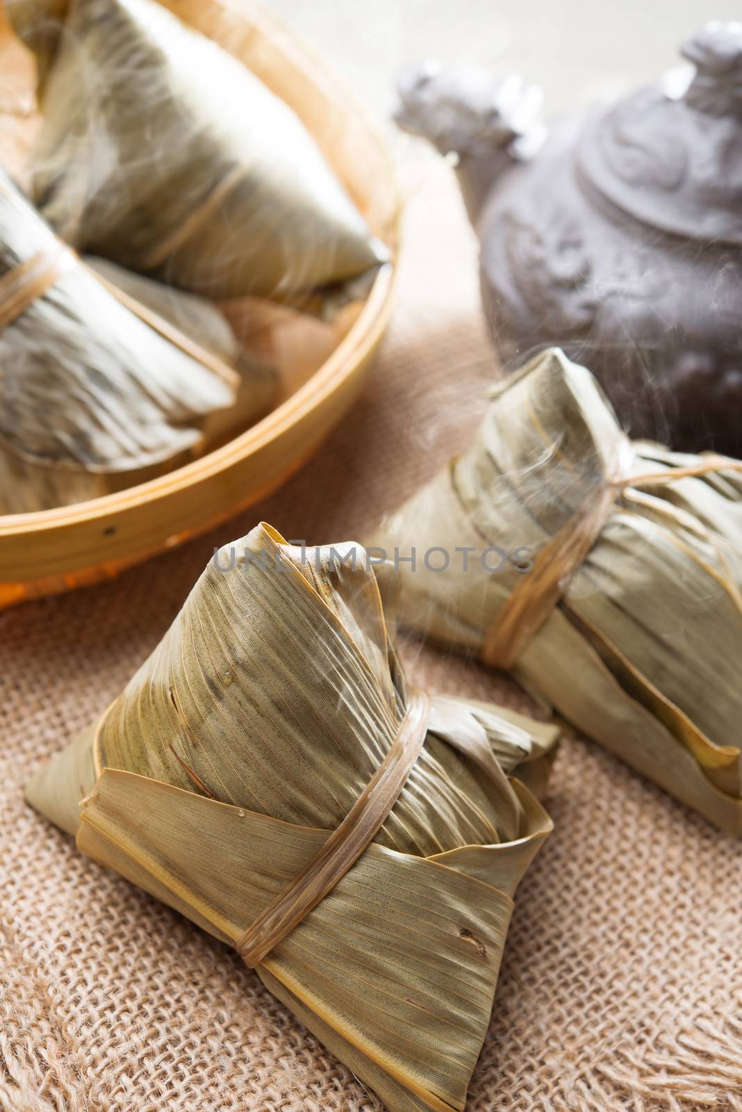 Asian Chinese tradition food - steamed rice dumpling with tea.