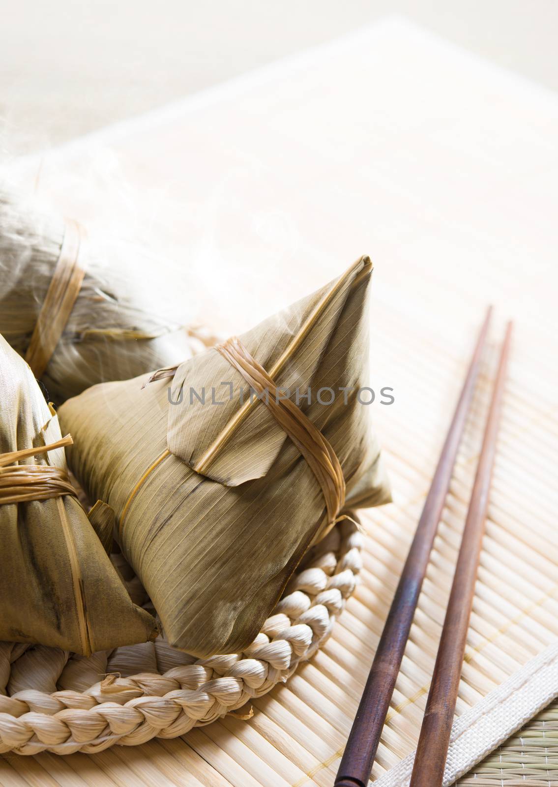 Chinese rice dumplings on bamboo place mat