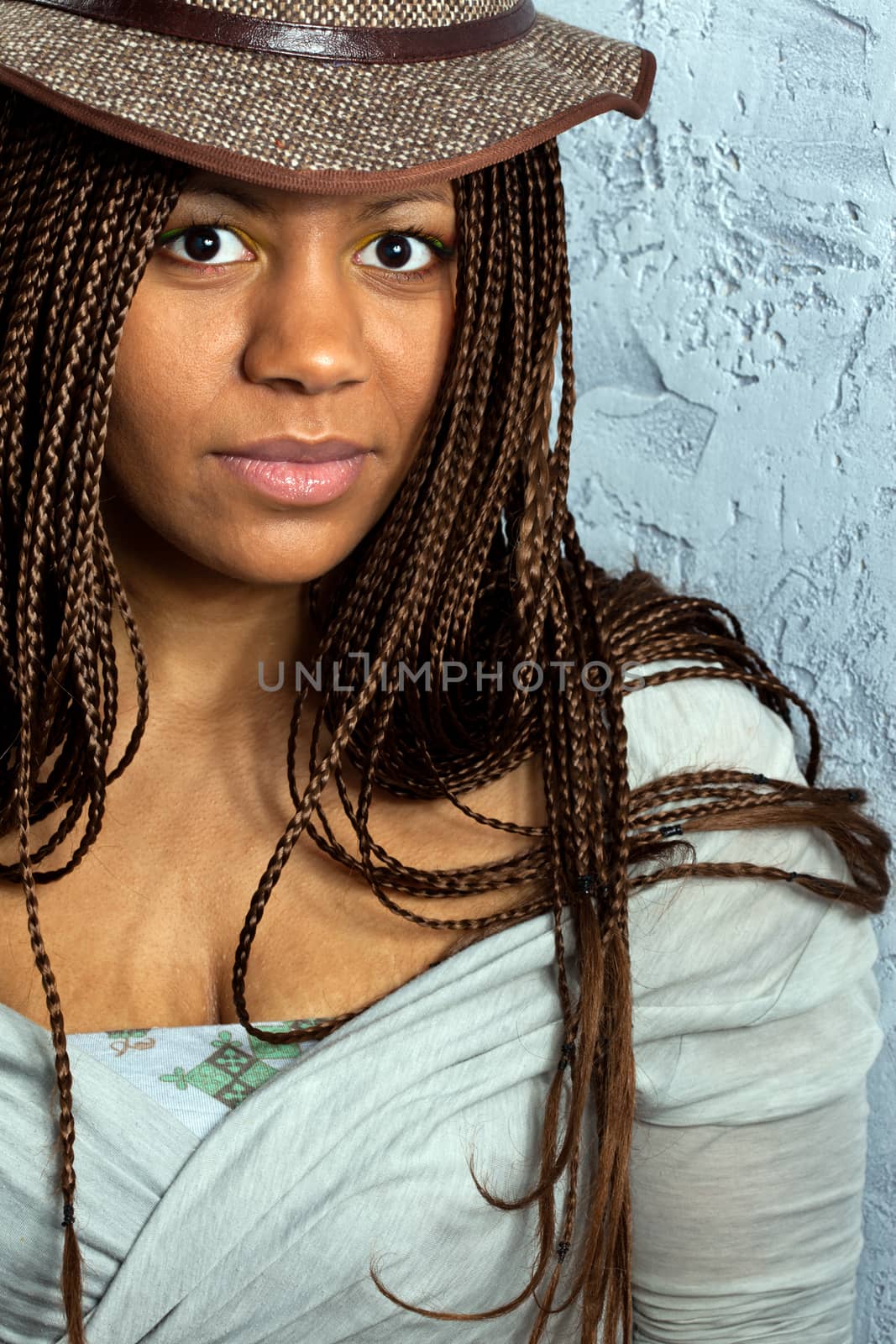 young black woman in a hat