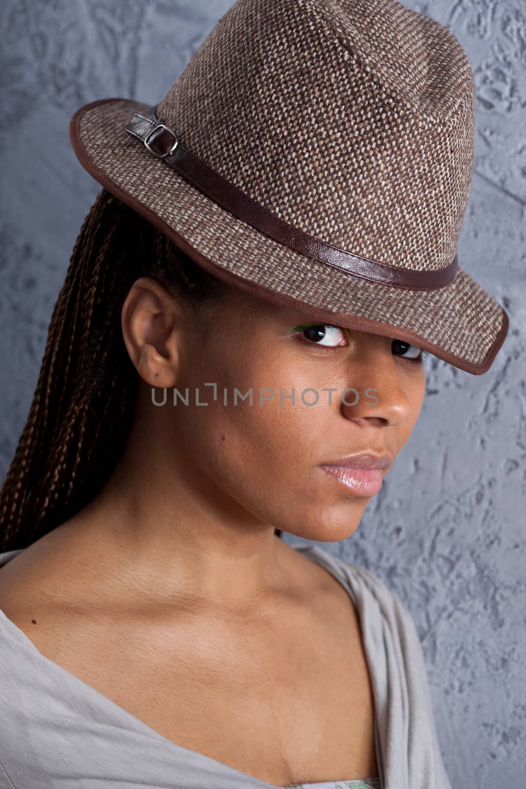 young woman in hat by Astroid