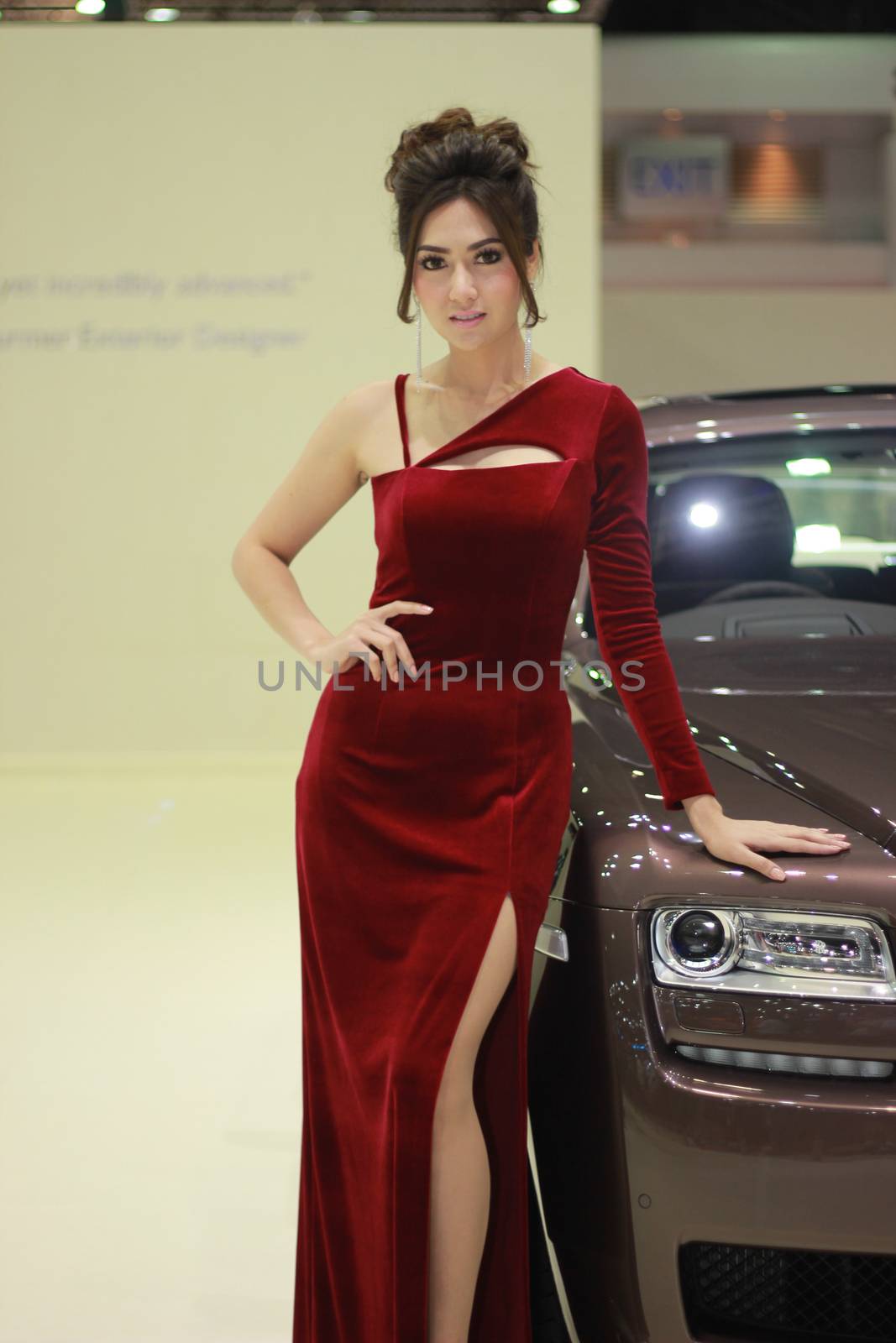 BANGKOK, THAILAND - MARCH 30, 2014: Unidentified female presenter pose in the 35th Bangkok International Motor Show on March 30, 2014 in Nonthaburi, Thailand.