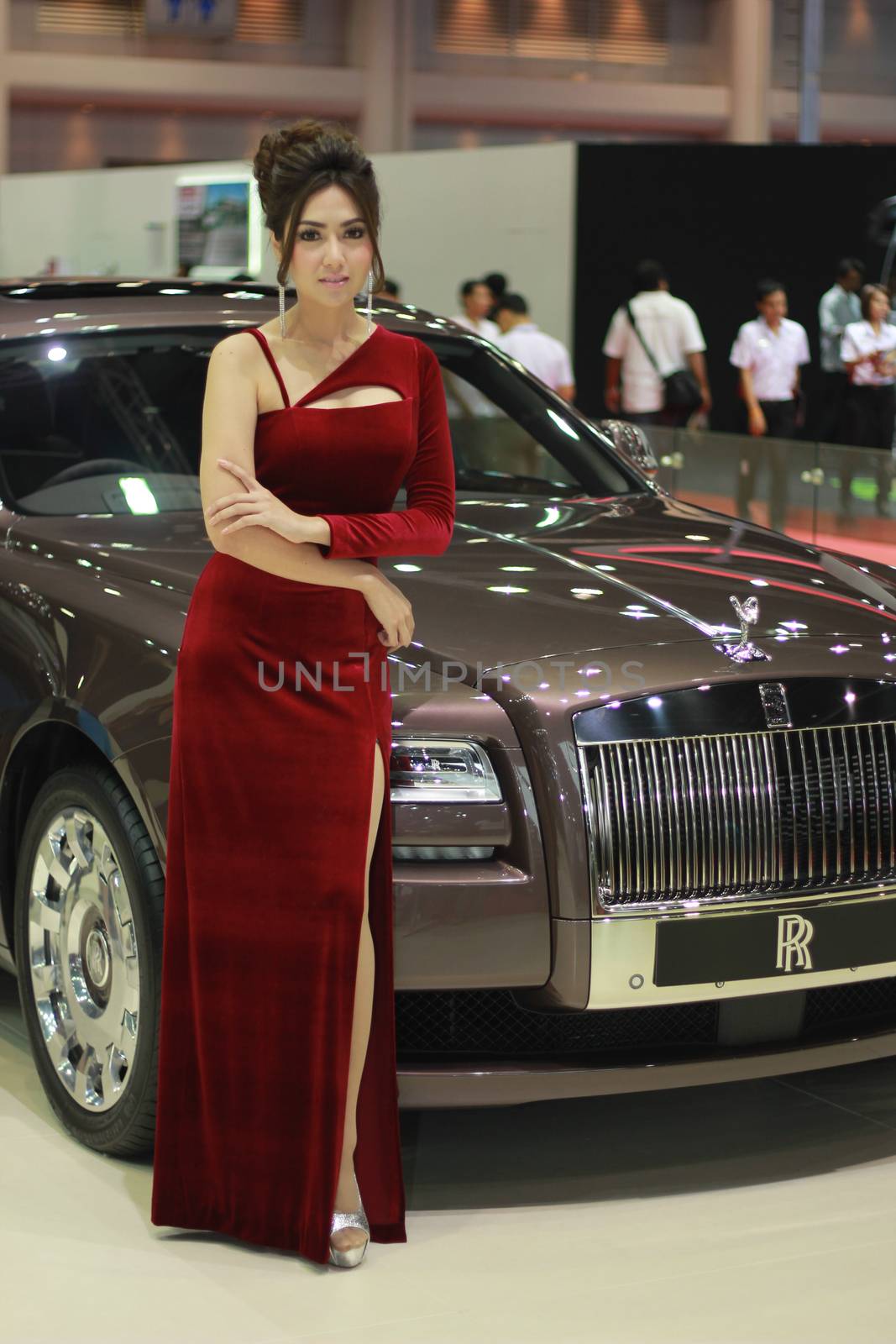 BANGKOK, THAILAND - MARCH 30, 2014: Unidentified female presenter pose in the 35th Bangkok International Motor Show on March 30, 2014 in Nonthaburi, Thailand.