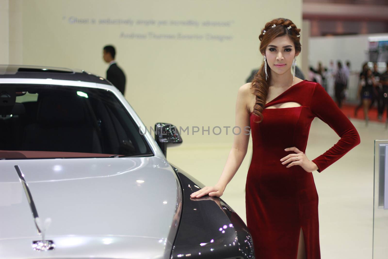 BANGKOK, THAILAND - MARCH 30, 2014: Unidentified female presenter pose in the 35th Bangkok International Motor Show on March 30, 2014 in Nonthaburi, Thailand.