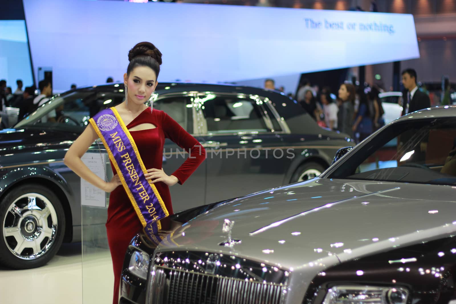 BANGKOK, THAILAND - MARCH 30, 2014: Unidentified female presenter pose in the 35th Bangkok International Motor Show on March 30, 2014 in Nonthaburi, Thailand.