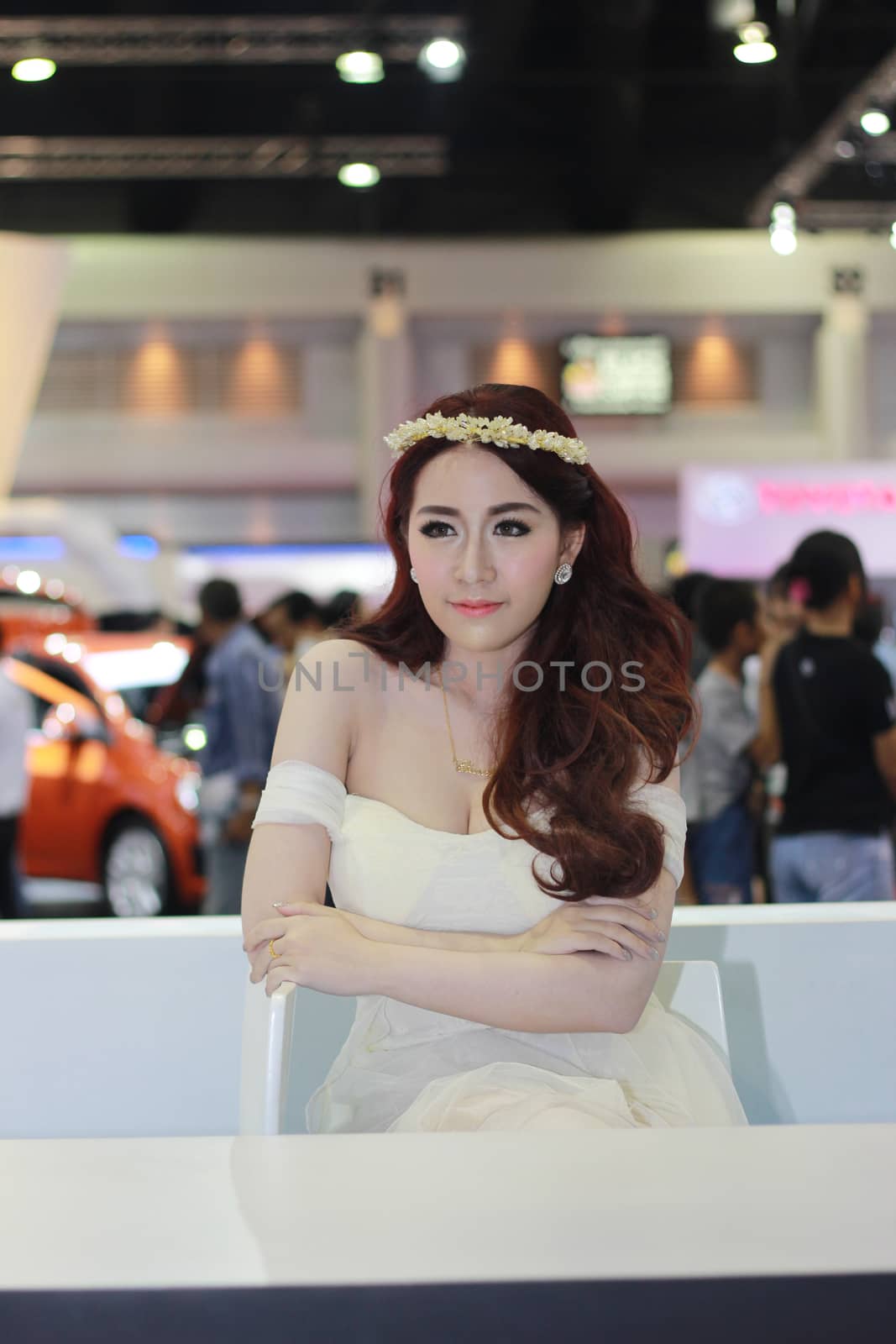 BANGKOK, THAILAND - MARCH 30, 2014: Unidentified female presenter pose in the 35th Bangkok International Motor Show on March 30, 2014 in Nonthaburi, Thailand.