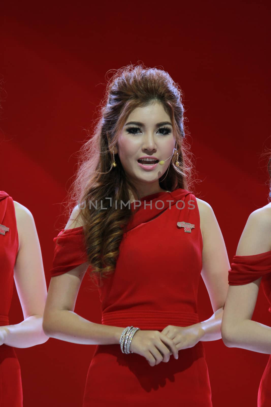 BANGKOK, THAILAND - MARCH 30, 2014: Unidentified female presenter pose in the 35th Bangkok International Motor Show on March 30, 2014 in Nonthaburi, Thailand.