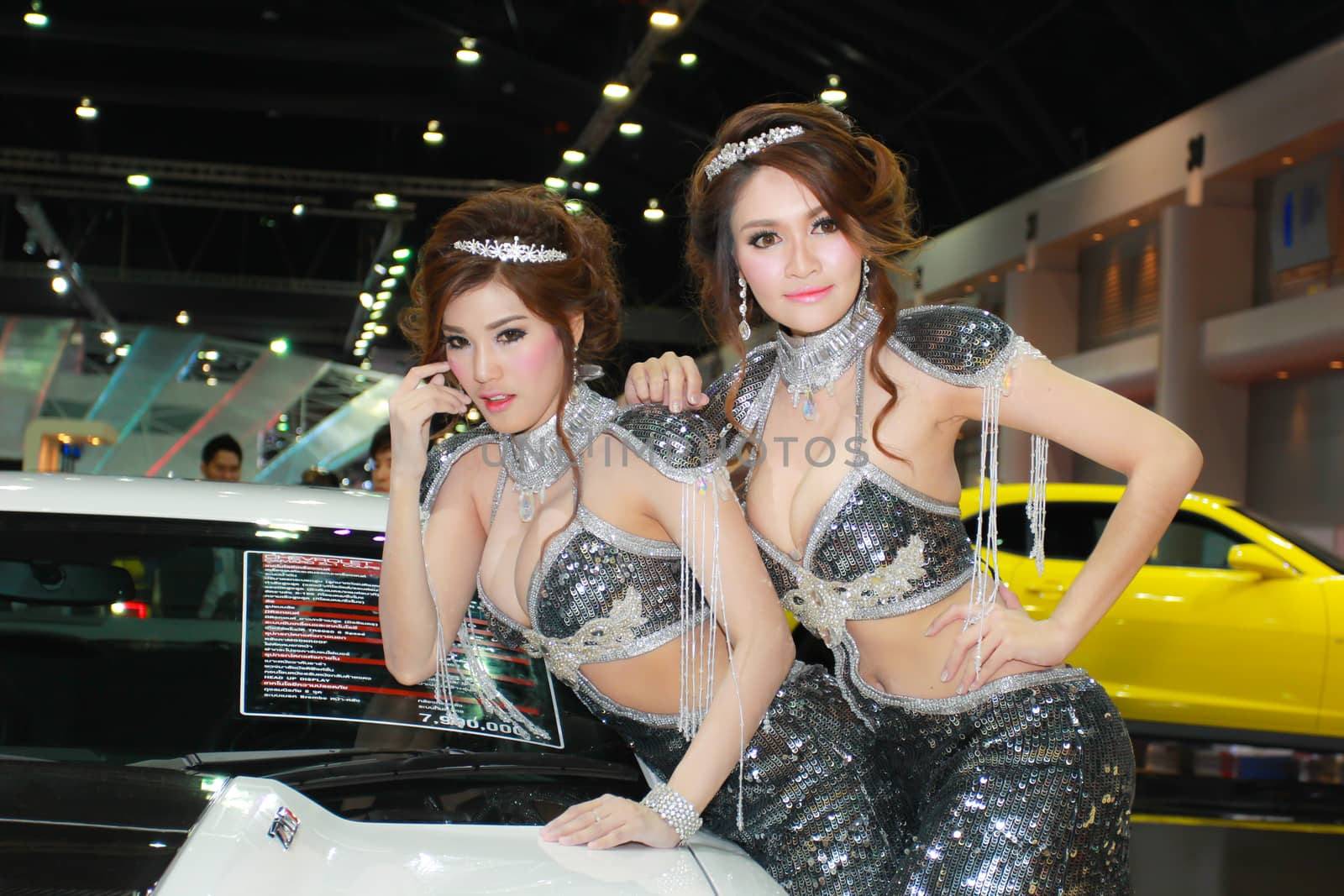 BANGKOK, THAILAND - MARCH 30, 2014: Unidentified female presenter pose in the 35th Bangkok International Motor Show on March 30, 2014 in Bangkok, Thailand.