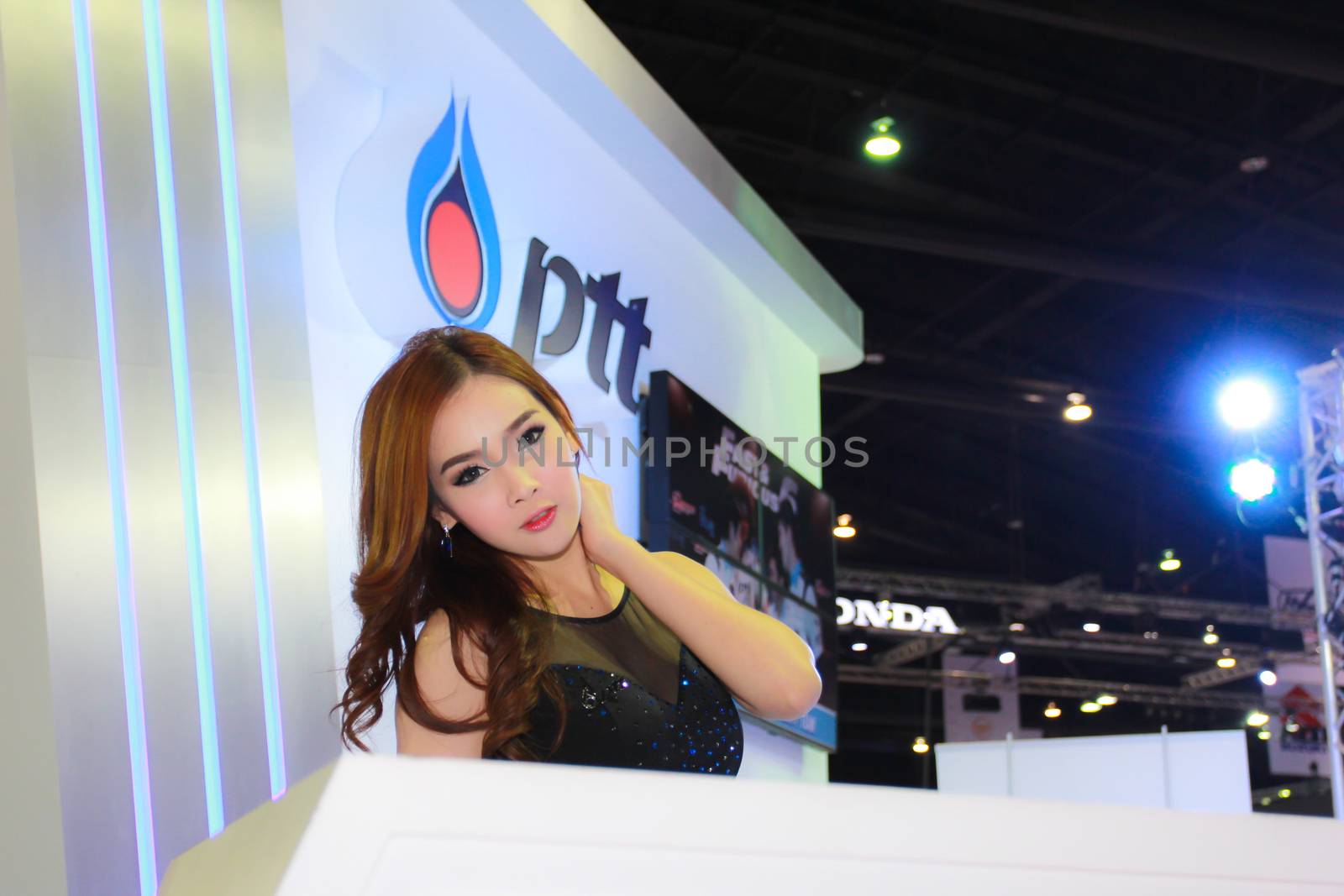 BANGKOK, THAILAND - MARCH 30, 2014: Unidentified female presenter pose in the 35th Bangkok International Motor Show on March 30, 2014 in Bangkok, Thailand.