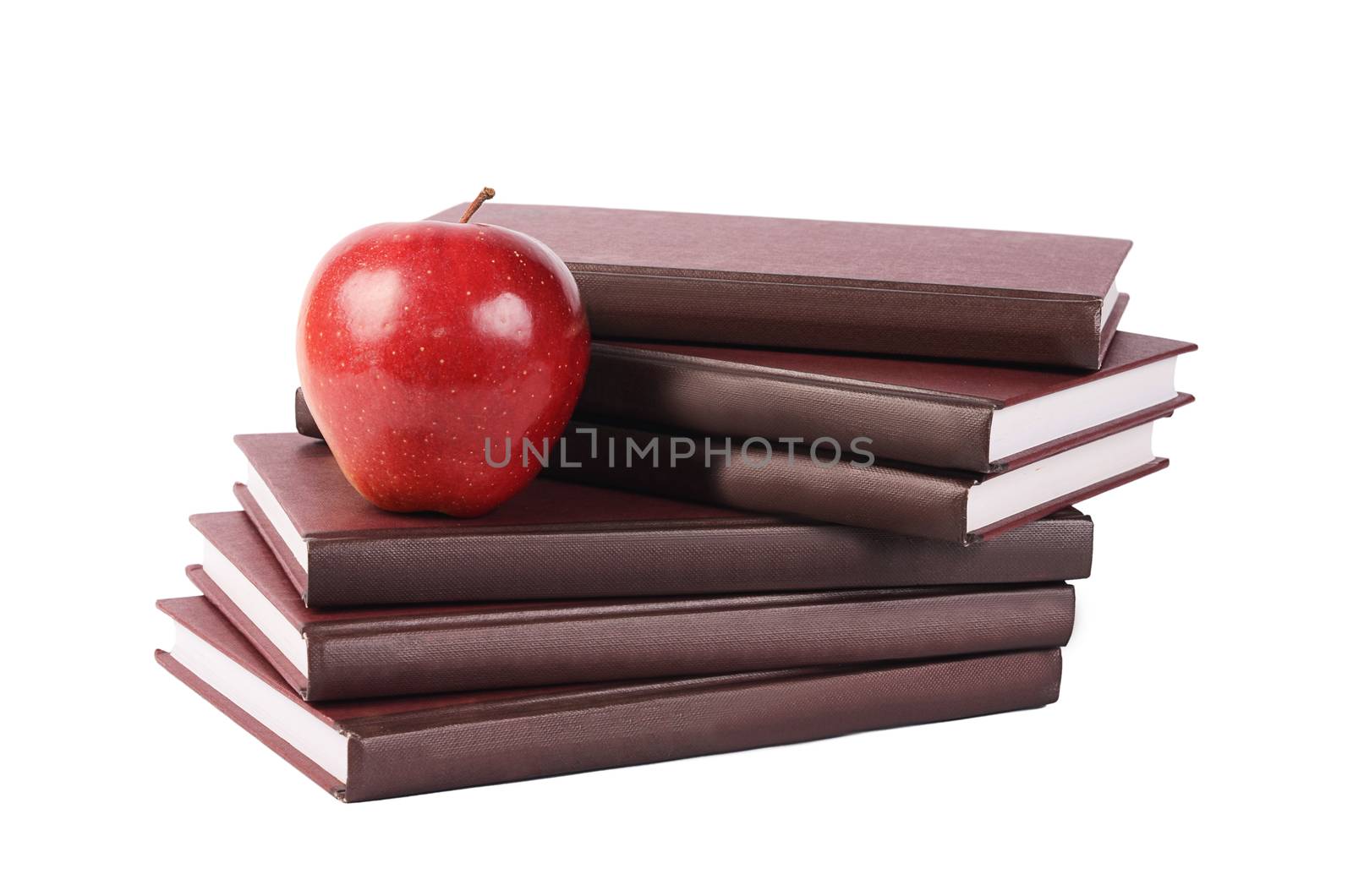 Book with apple isolated on white  background