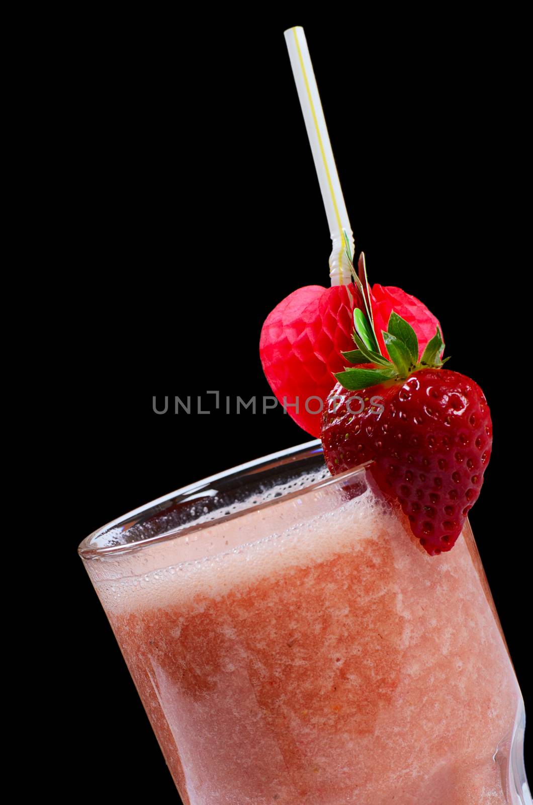 The strawberry smoothie on a black background