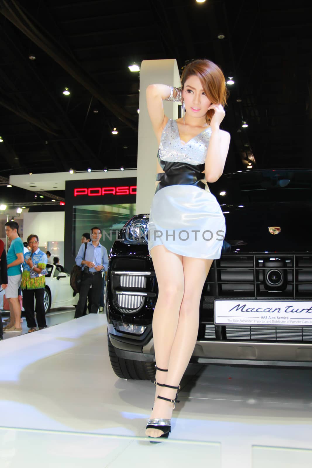 BANGKOK, THAILAND - MARCH 30, 2014: Unidentified female presenter pose in the 35th Bangkok International Motor Show on March 30, 2014 in Bangkok, Thailand.