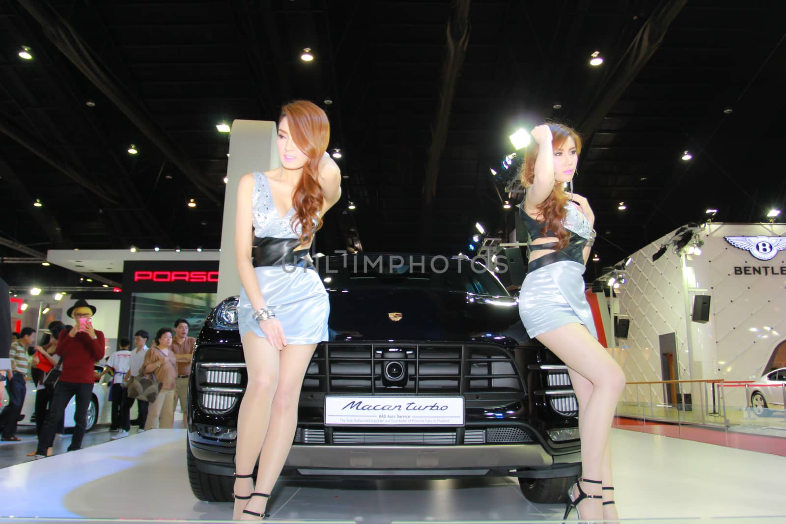 BANGKOK, THAILAND - MARCH 30, 2014: Unidentified female presenter pose in the 35th Bangkok International Motor Show on March 30, 2014 in Bangkok, Thailand.