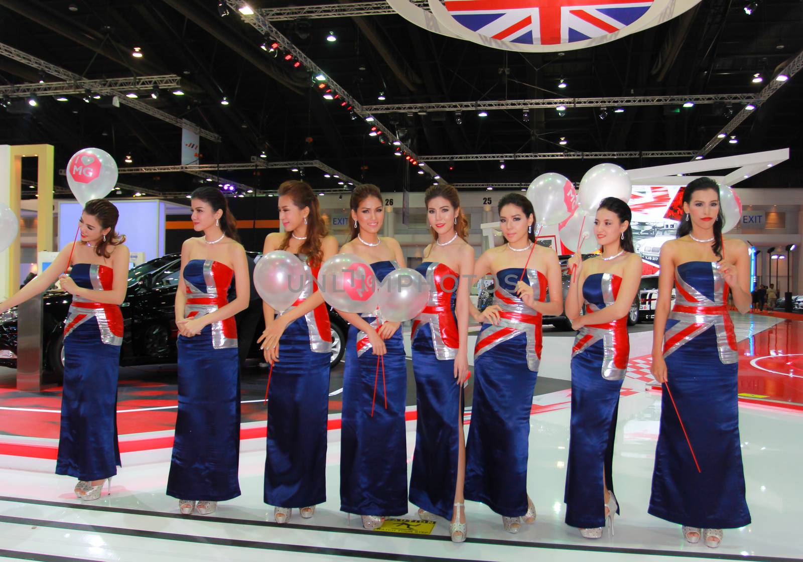 BANGKOK, THAILAND - MARCH 30, 2014: Unidentified female presenter pose in the 35th Bangkok International Motor Show on March 30, 2014 in Bangkok, Thailand.