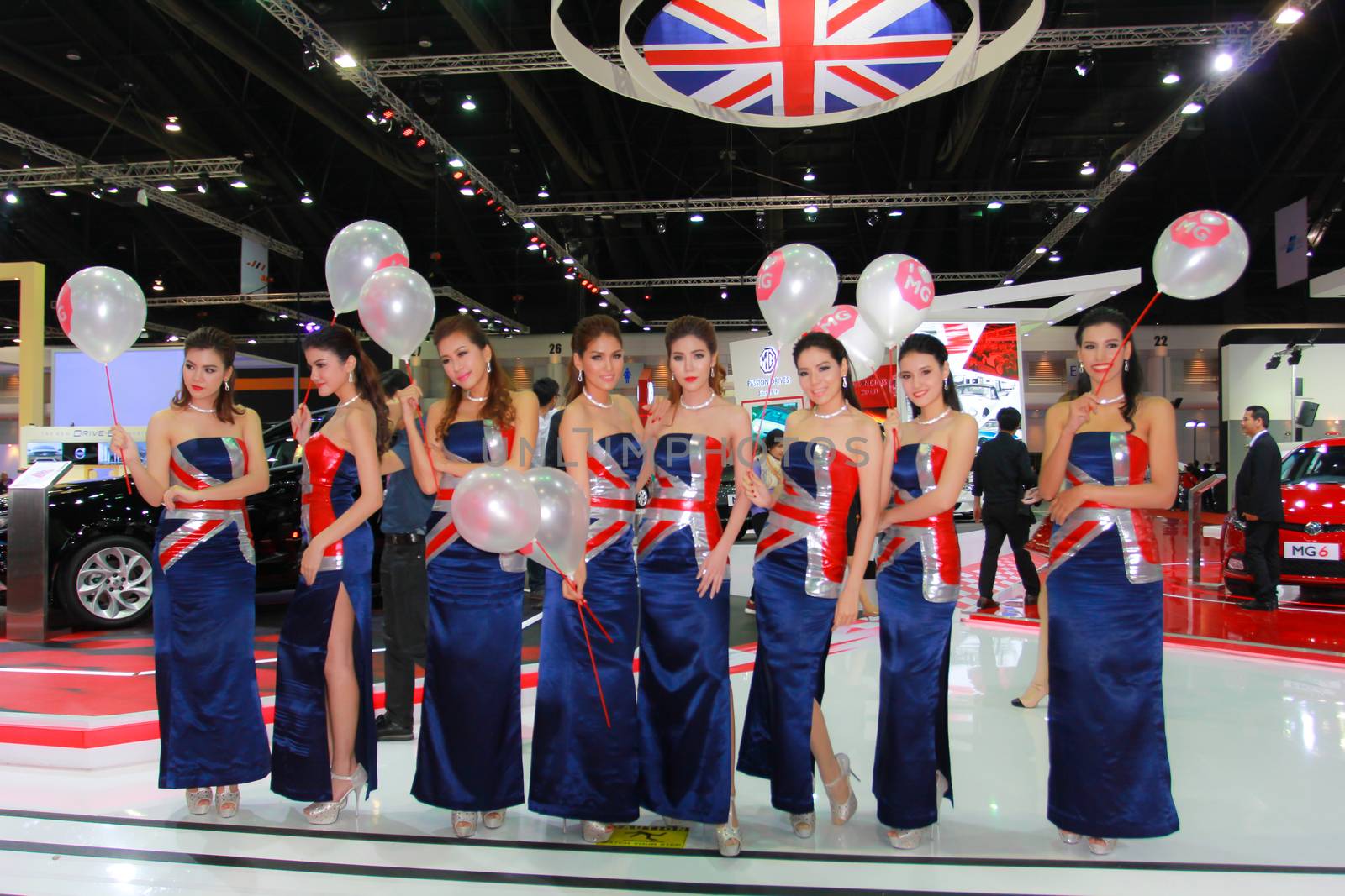 BANGKOK, THAILAND - MARCH 30, 2014: Unidentified female presenter pose in the 35th Bangkok International Motor Show on March 30, 2014 in Bangkok, Thailand.