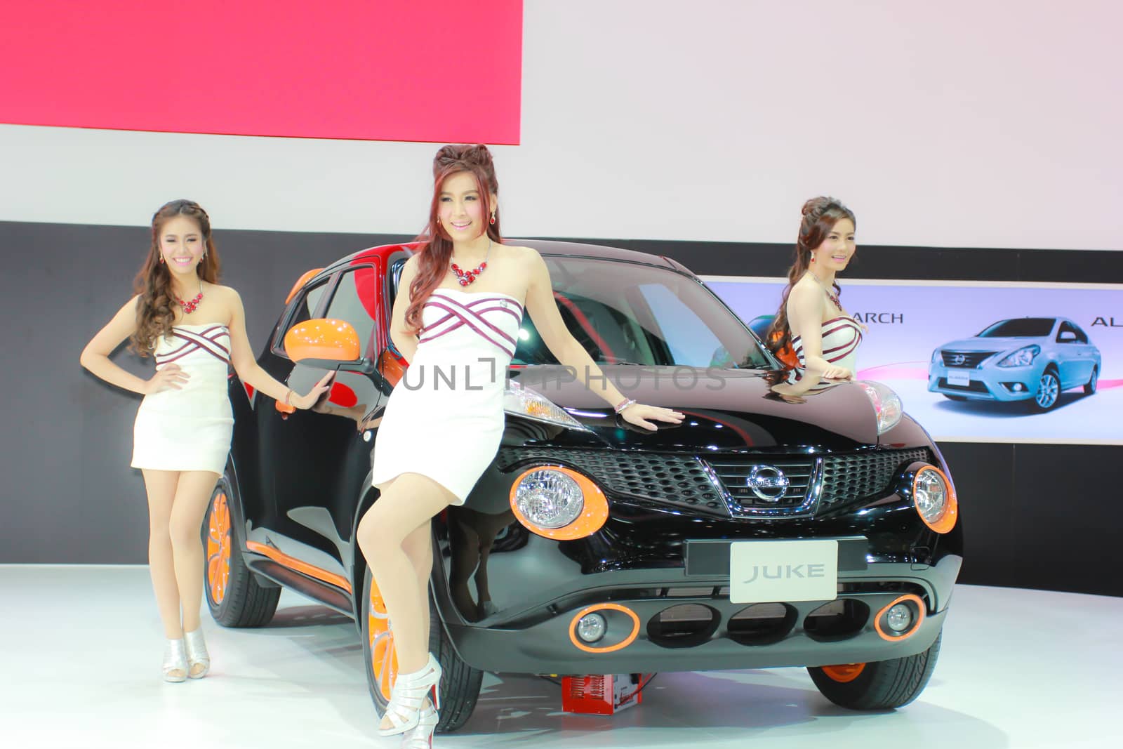 BANGKOK, THAILAND - MARCH 30, 2014: Unidentified female presenter pose in the 35th Bangkok International Motor Show on March 30, 2014 in Bangkok, Thailand.