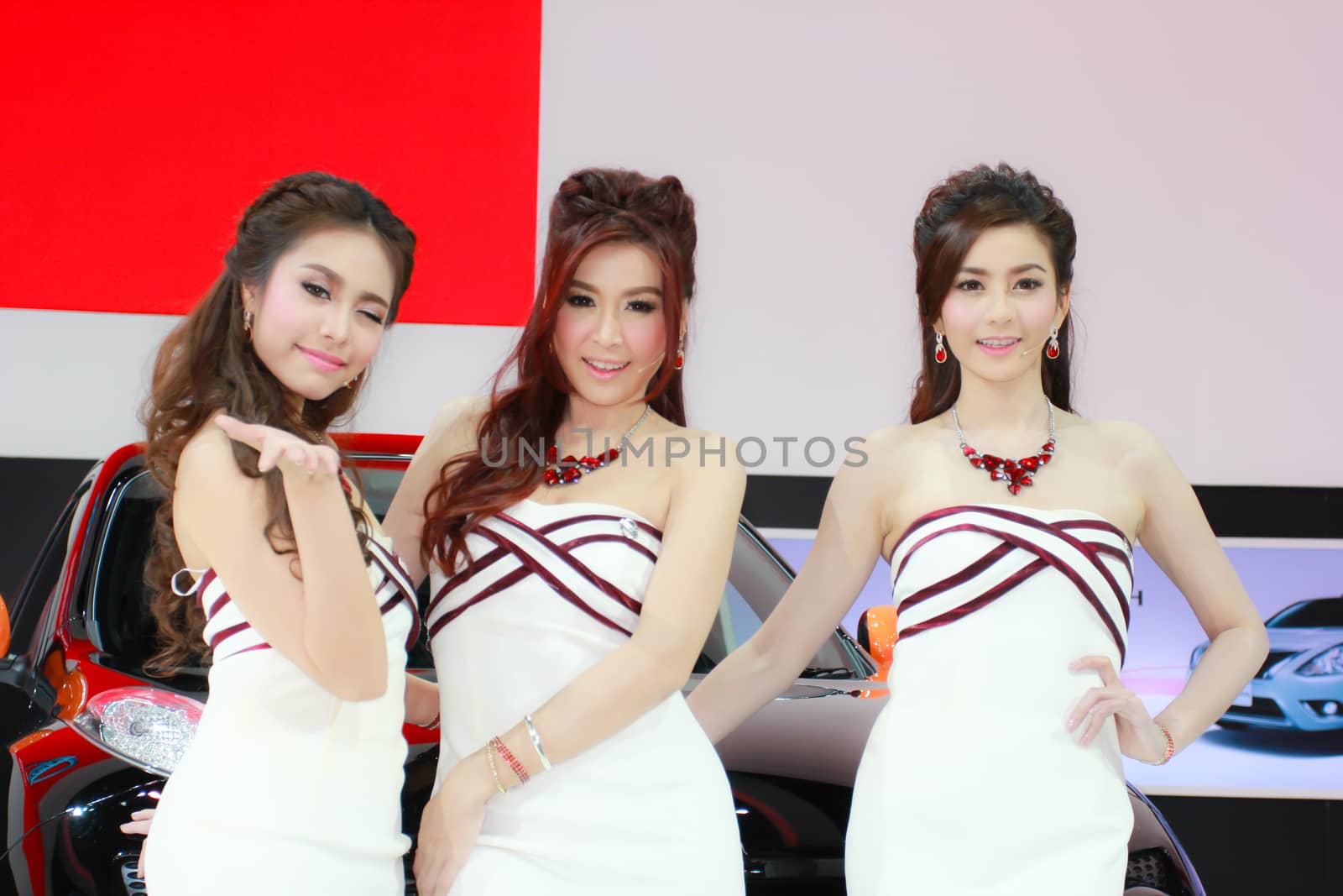 BANGKOK, THAILAND - MARCH 30, 2014: Unidentified female presenter pose in the 35th Bangkok International Motor Show on March 30, 2014 in Bangkok, Thailand.