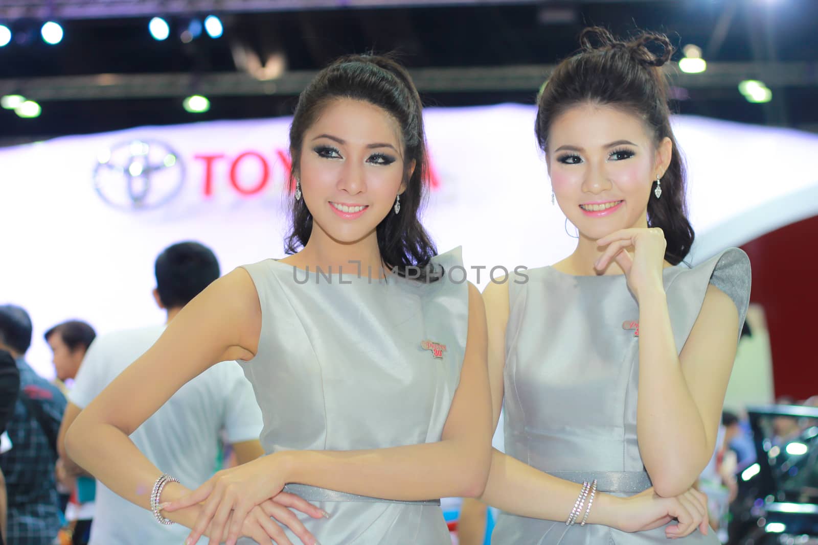 BANGKOK, THAILAND - MARCH 30, 2014: Unidentified female presenter pose in the 35th Bangkok International Motor Show on March 30, 2014 in Bangkok, Thailand.