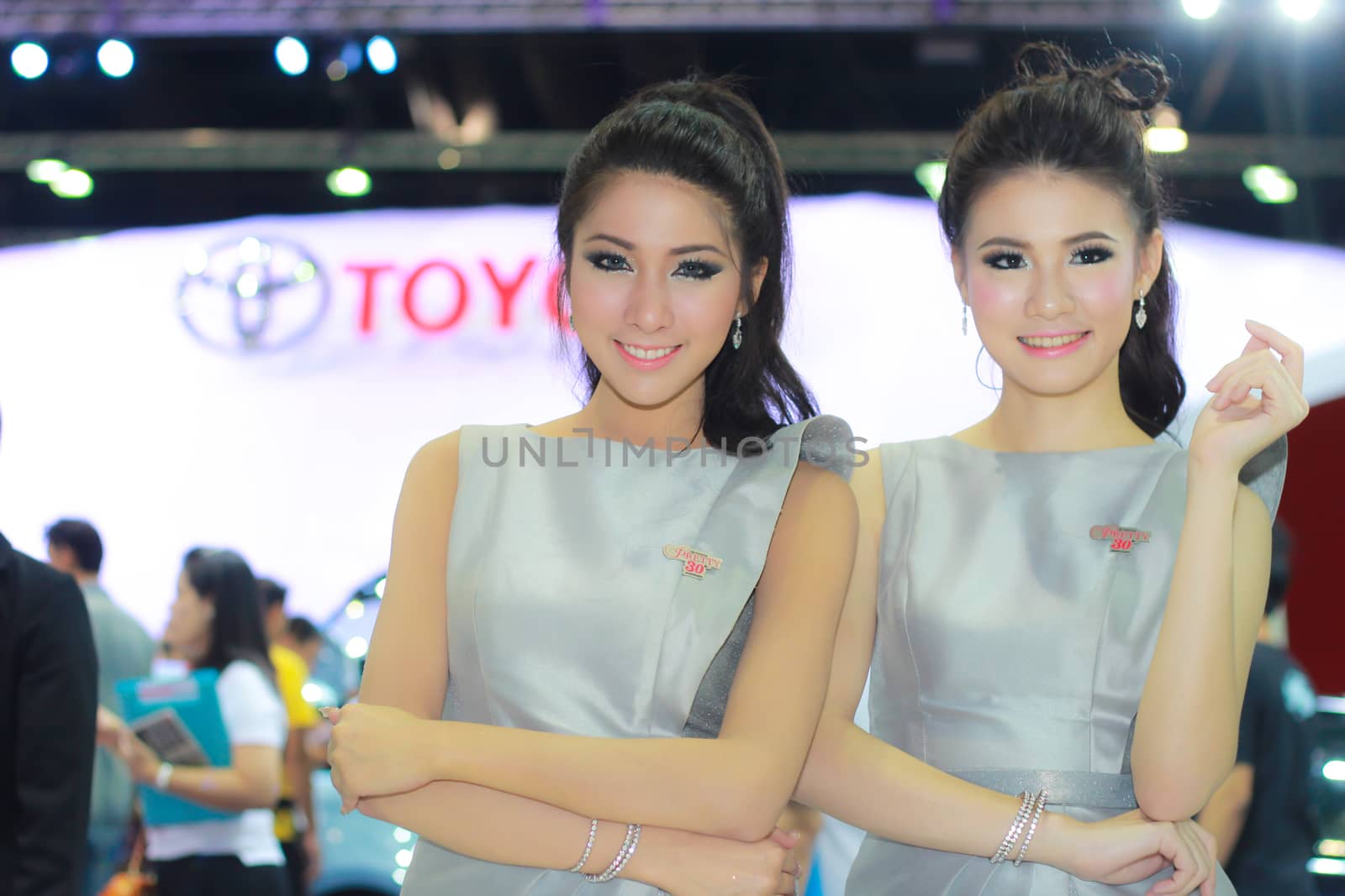 BANGKOK, THAILAND - MARCH 30, 2014: Unidentified female presenter pose in the 35th Bangkok International Motor Show on March 30, 2014 in Bangkok, Thailand.