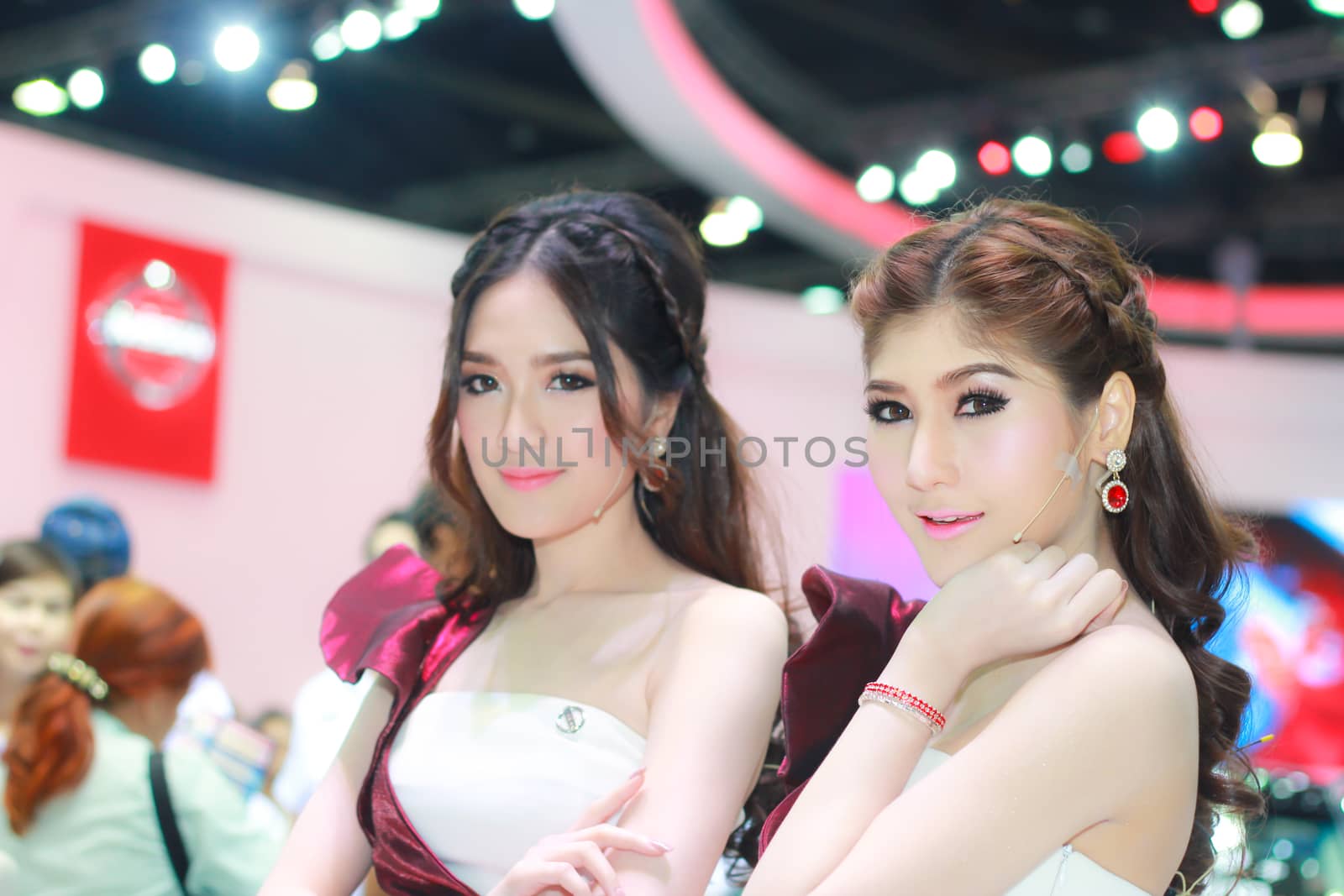 BANGKOK, THAILAND - MARCH 30, 2014: Unidentified female presenter pose in the 35th Bangkok International Motor Show on March 30, 2014 in Bangkok, Thailand.