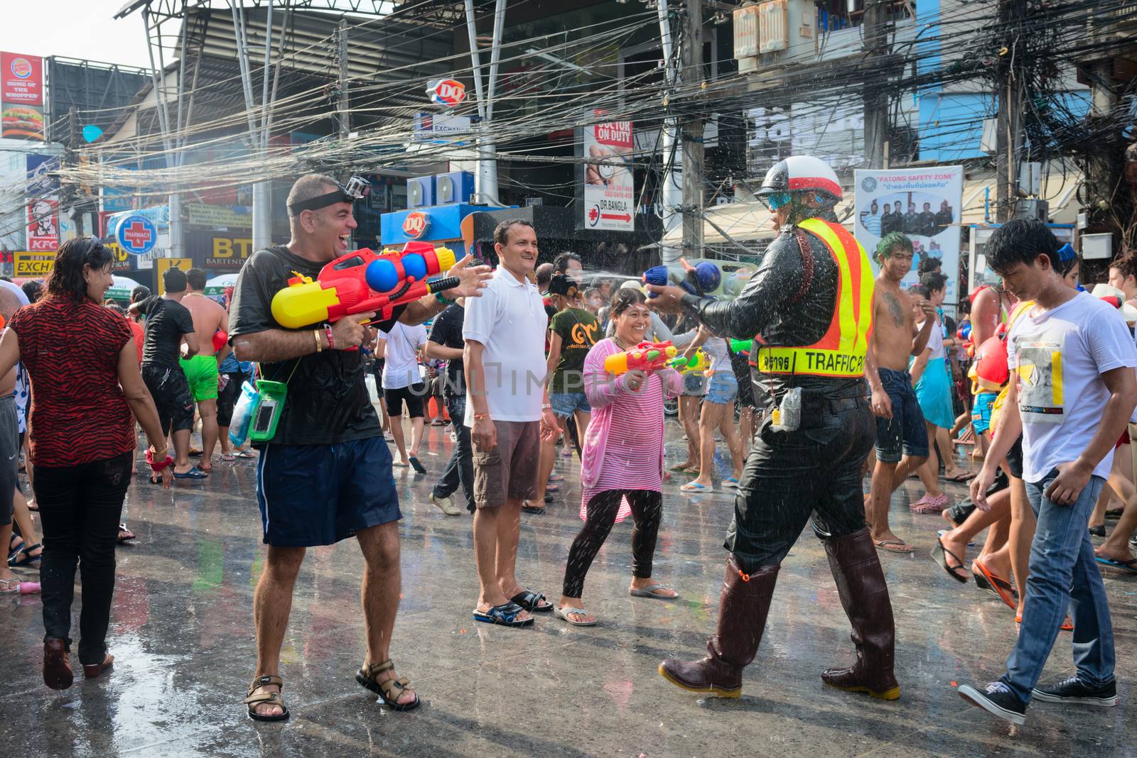 Celebration of Songkran Festival, the Thai New Year on Phuket by iryna_rasko