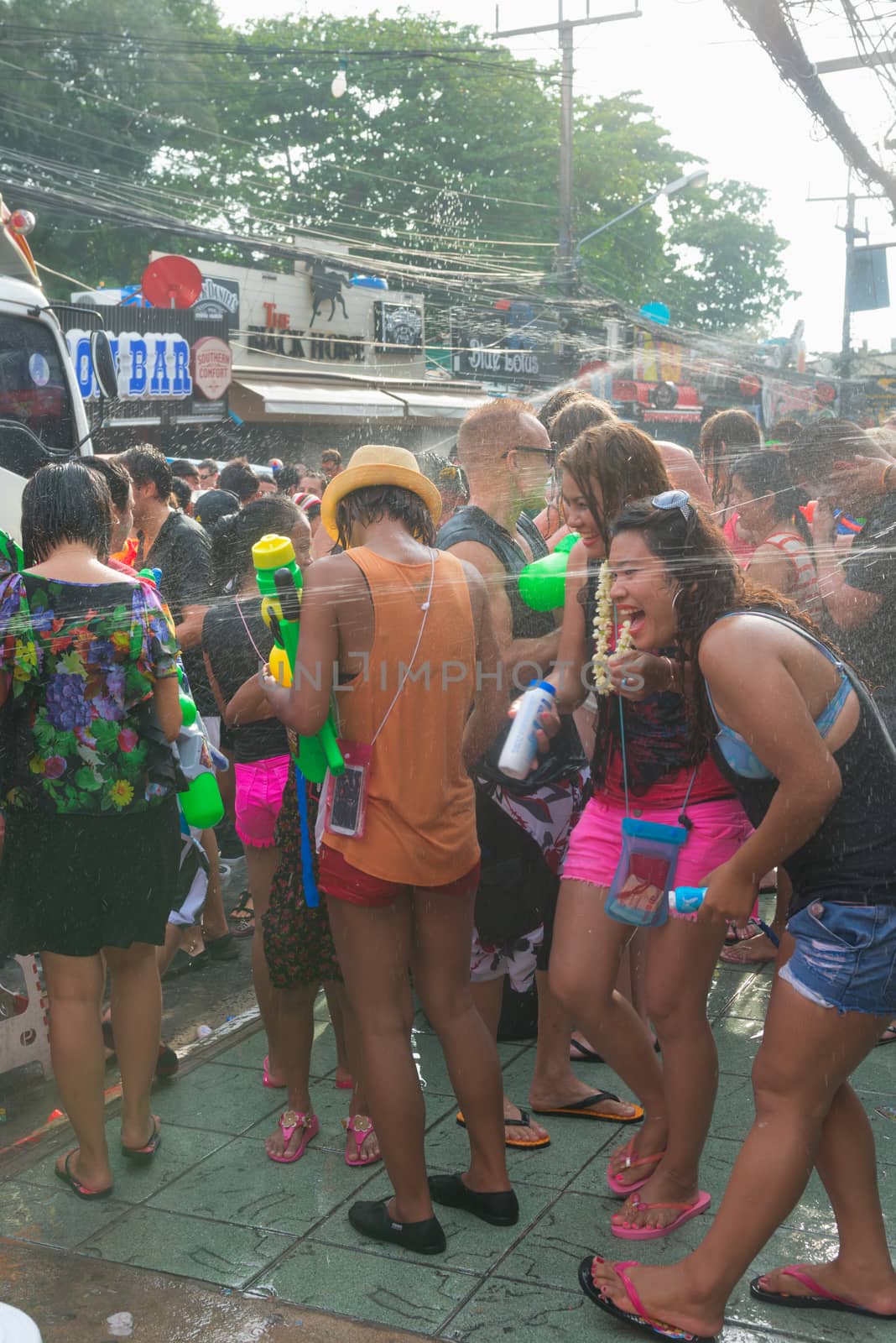 Celebration of Songkran Festival, the Thai New Year on Phuket by iryna_rasko