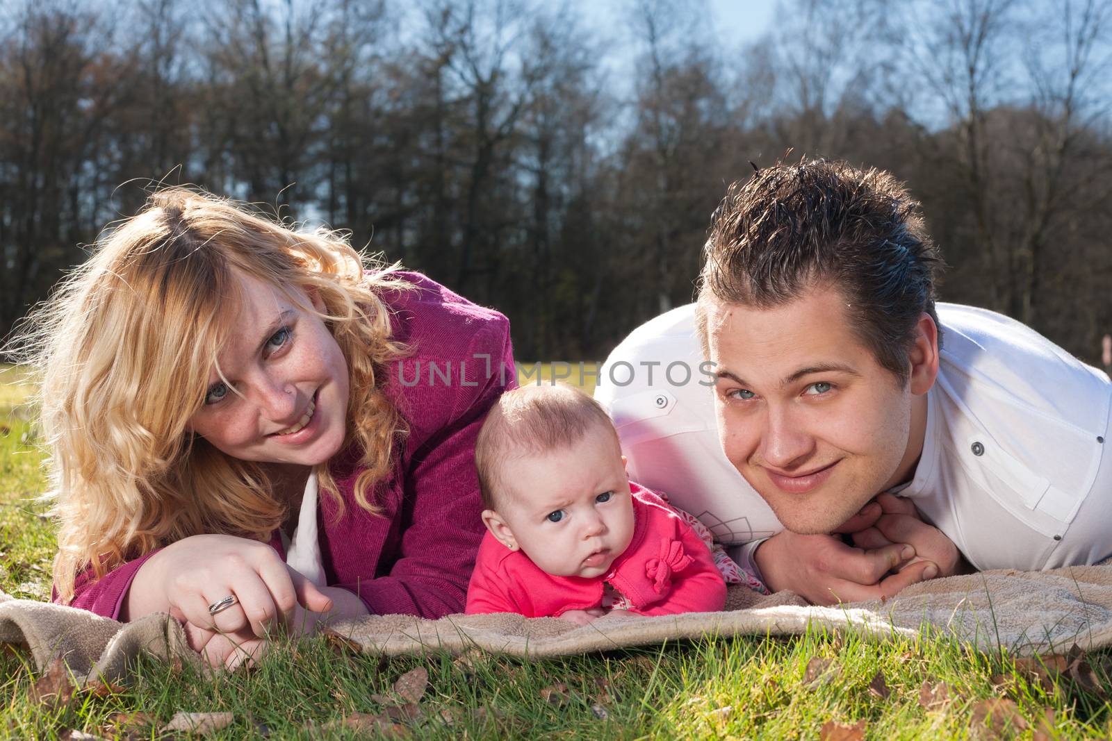 Happy family on a blanket by DNFStyle