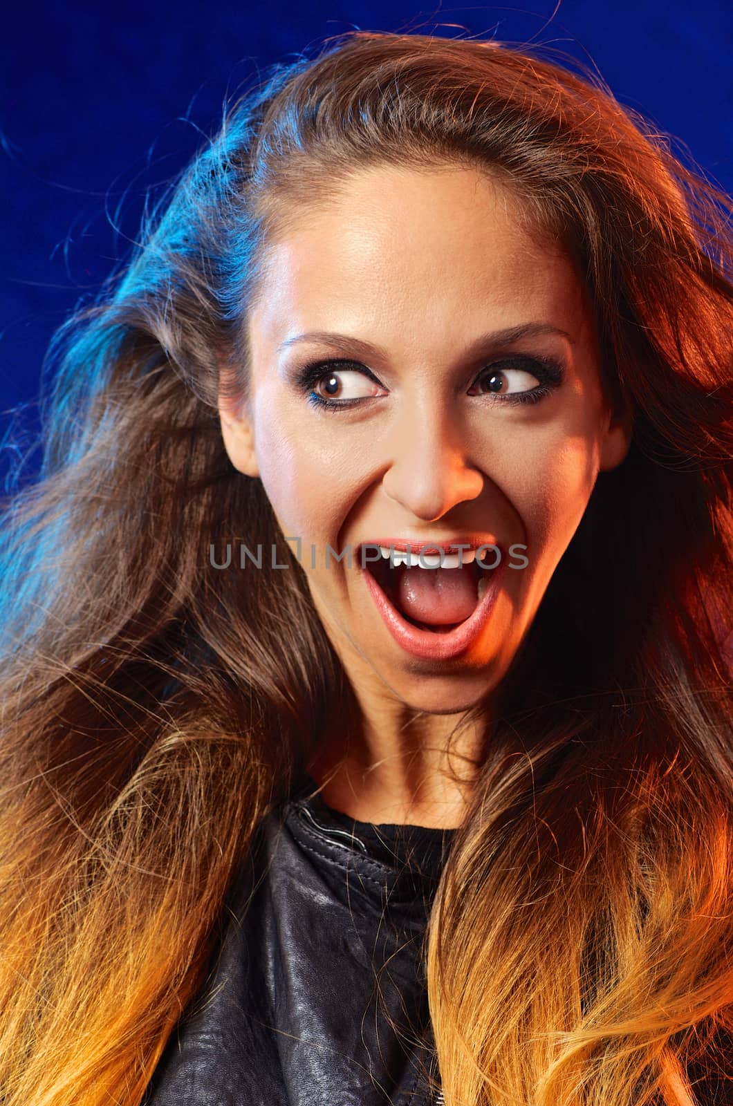 Emotional portrait of happy young woman