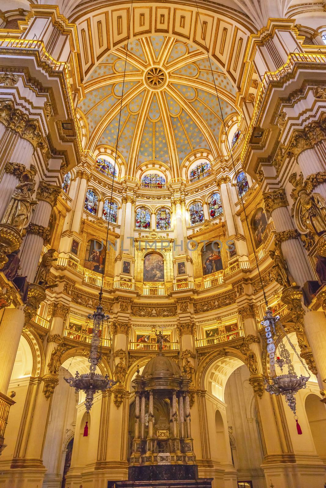 Basilica Dome Stained Glass Cathedral Andalusia Grandada Spain.  Built in the 1500s, housing the tombs of King Ferdinand and Isabella.  Dome by Diego de Siloe, 16th Century Stained Glass by Juan del Campo.