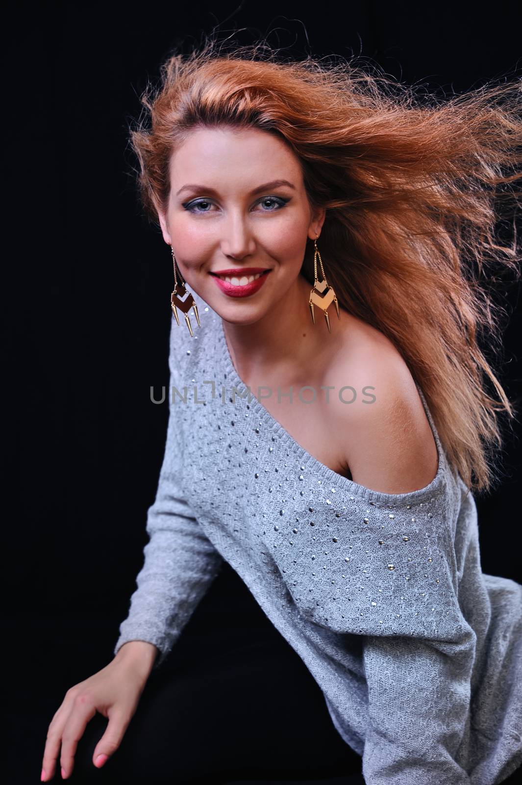 Young woman portrait with long red hair